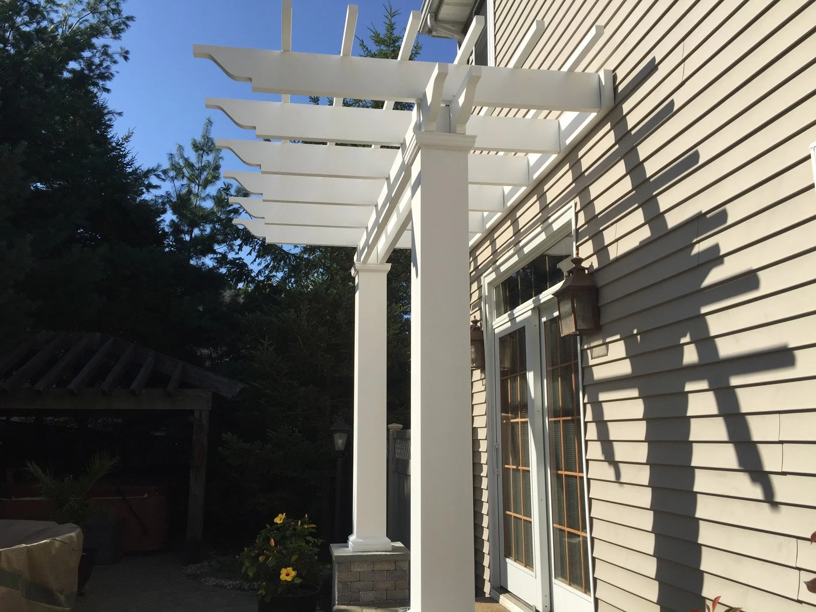 Landscape design with pergola in Long Island, NY