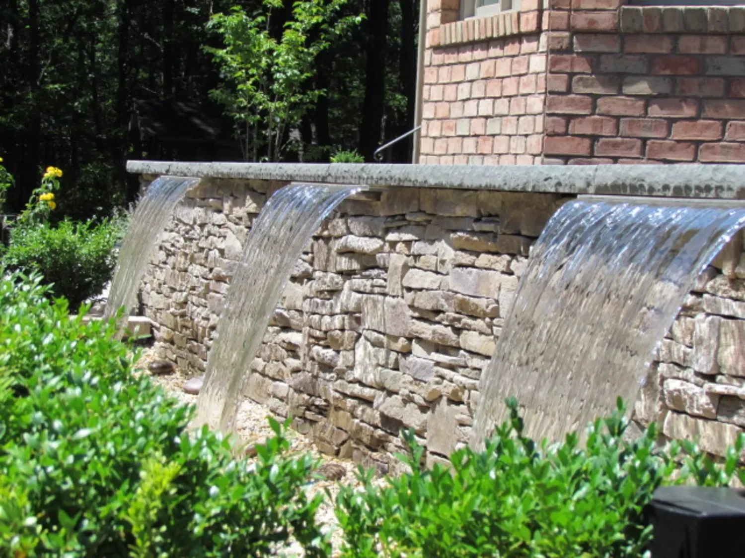 Landscape design project integrating pools and spas in Commack, NY