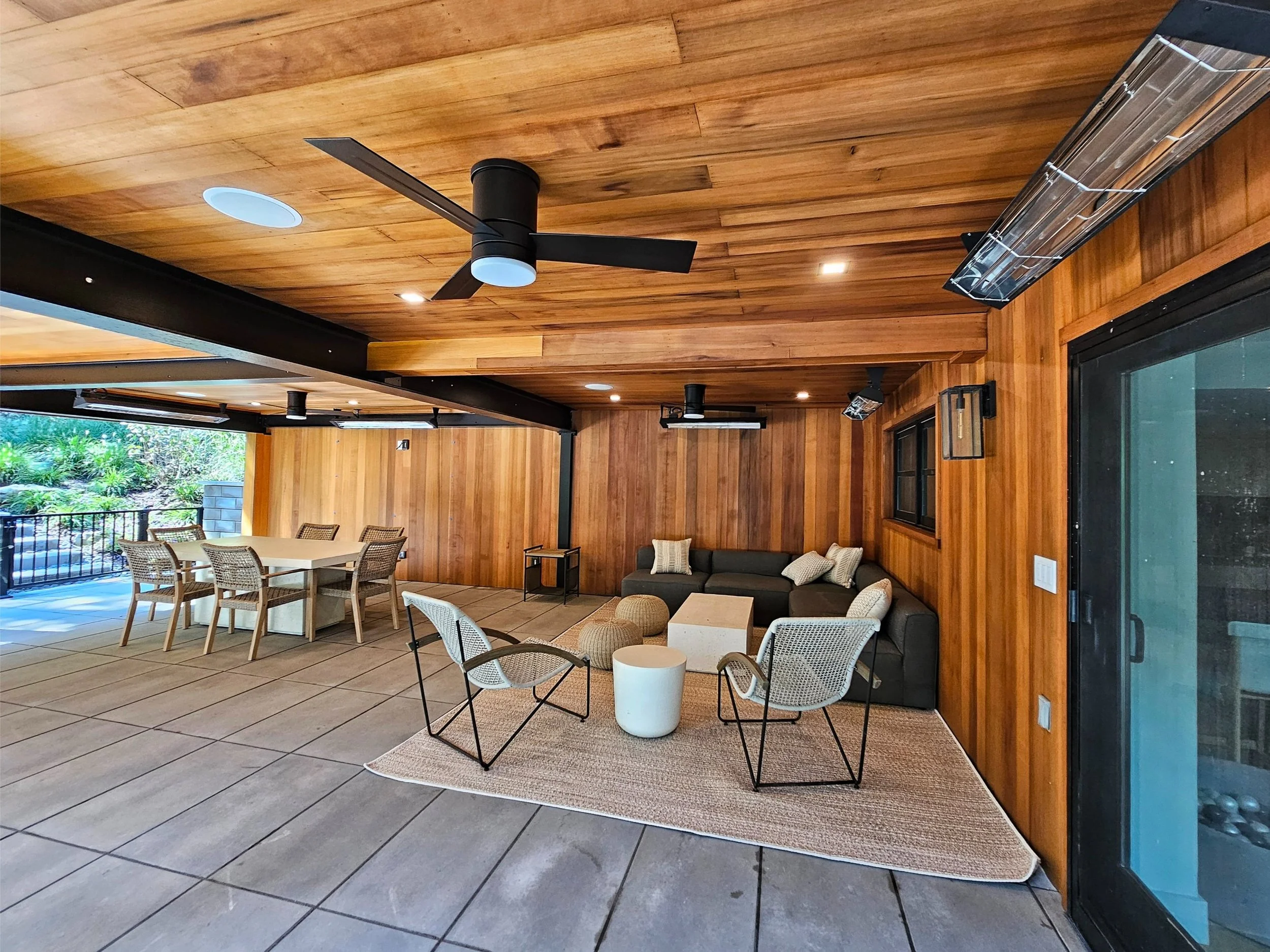 Patios and masonry design with custom stone patio and seating walls for outdoor living in Syosset, NY