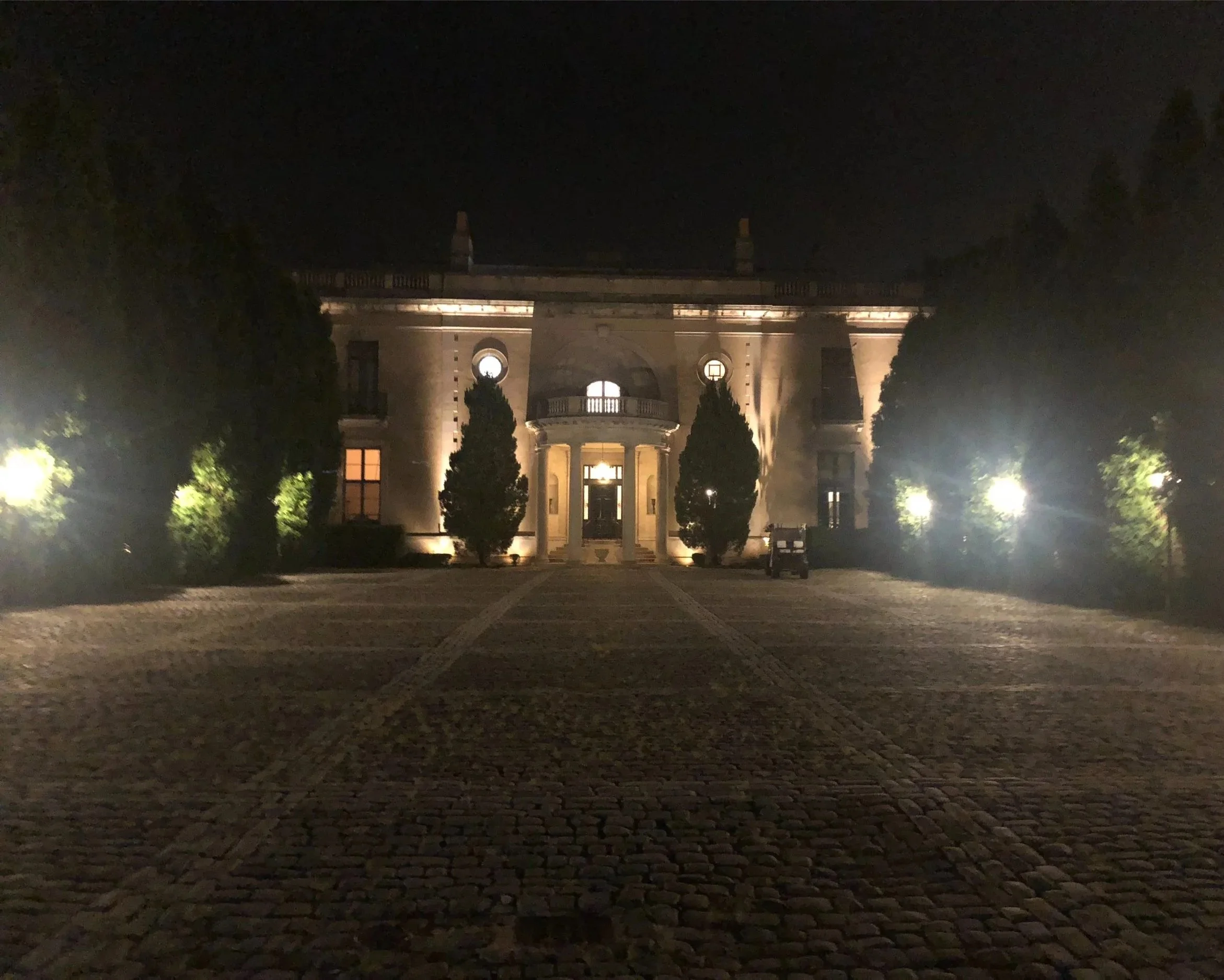 Architectural lighting emphasizing exterior textures and rooflines in Northport, NY