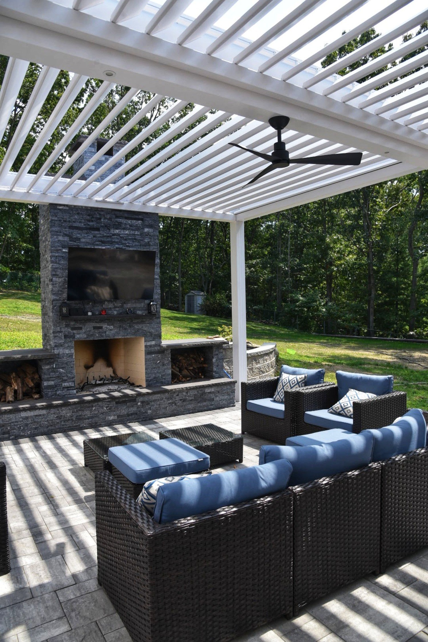 Motorized louvered pergola controlling sun and airflow in Holbrook, NY