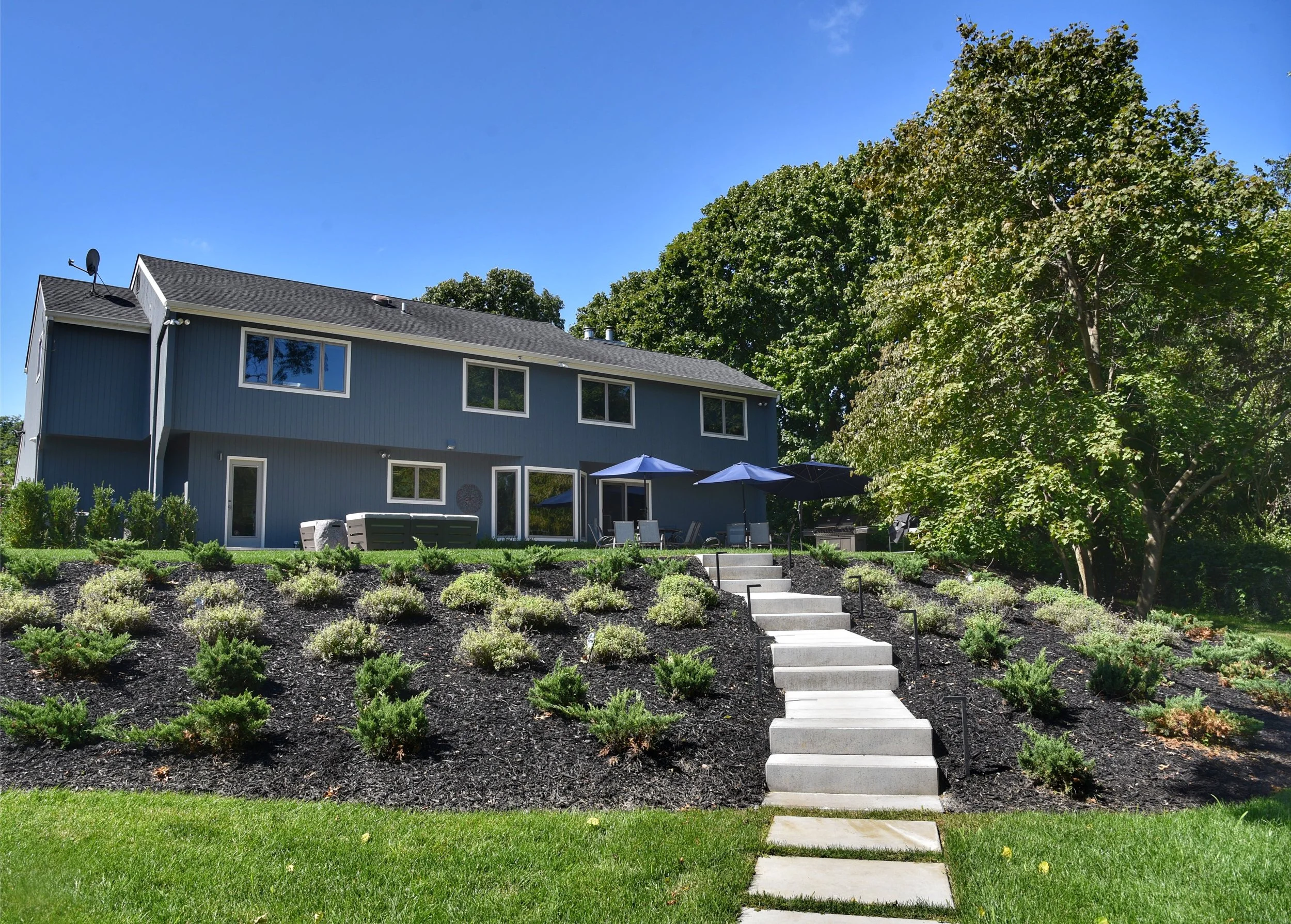 Outdoor masonry stairs designed for smooth transitions and long-term durability in Cold Spring Harbor, NY