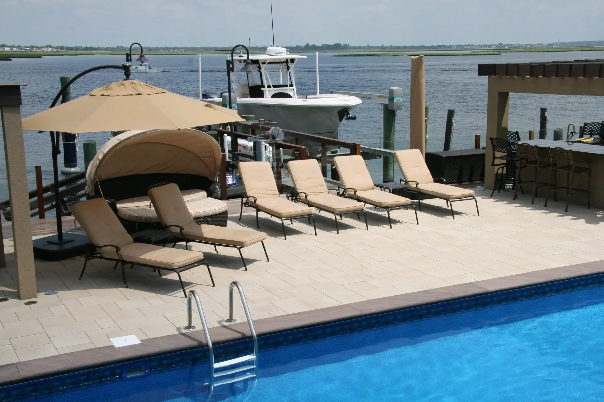 Custom Outdoor lighting enhancing patios and walkways in Southampton, NY