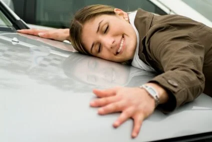 Woman Hugging Car