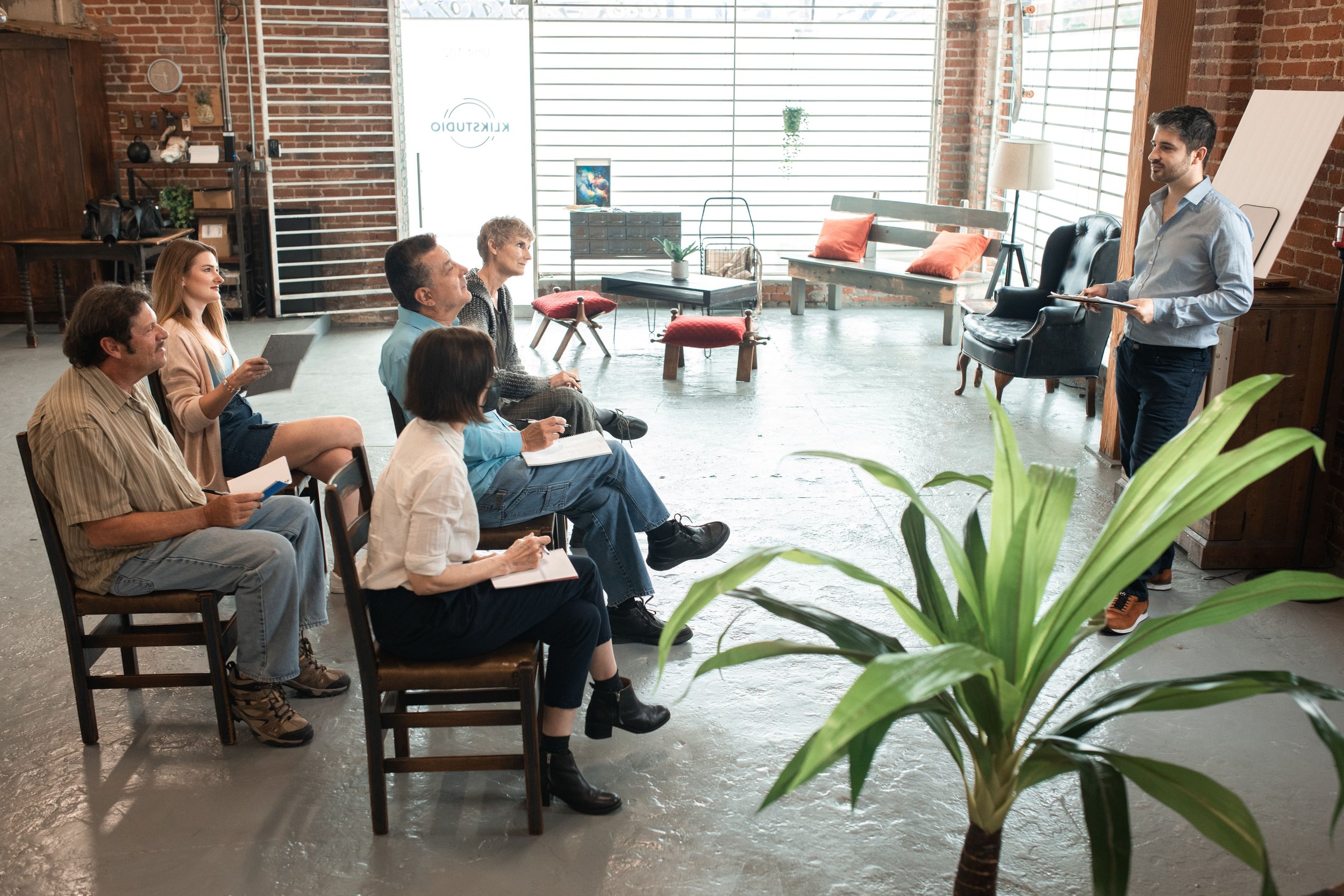 Diverse group of adults engaged in a  seminar