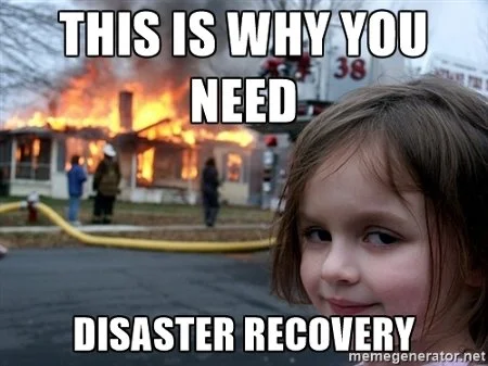 a little girl smiling with a fire in the background