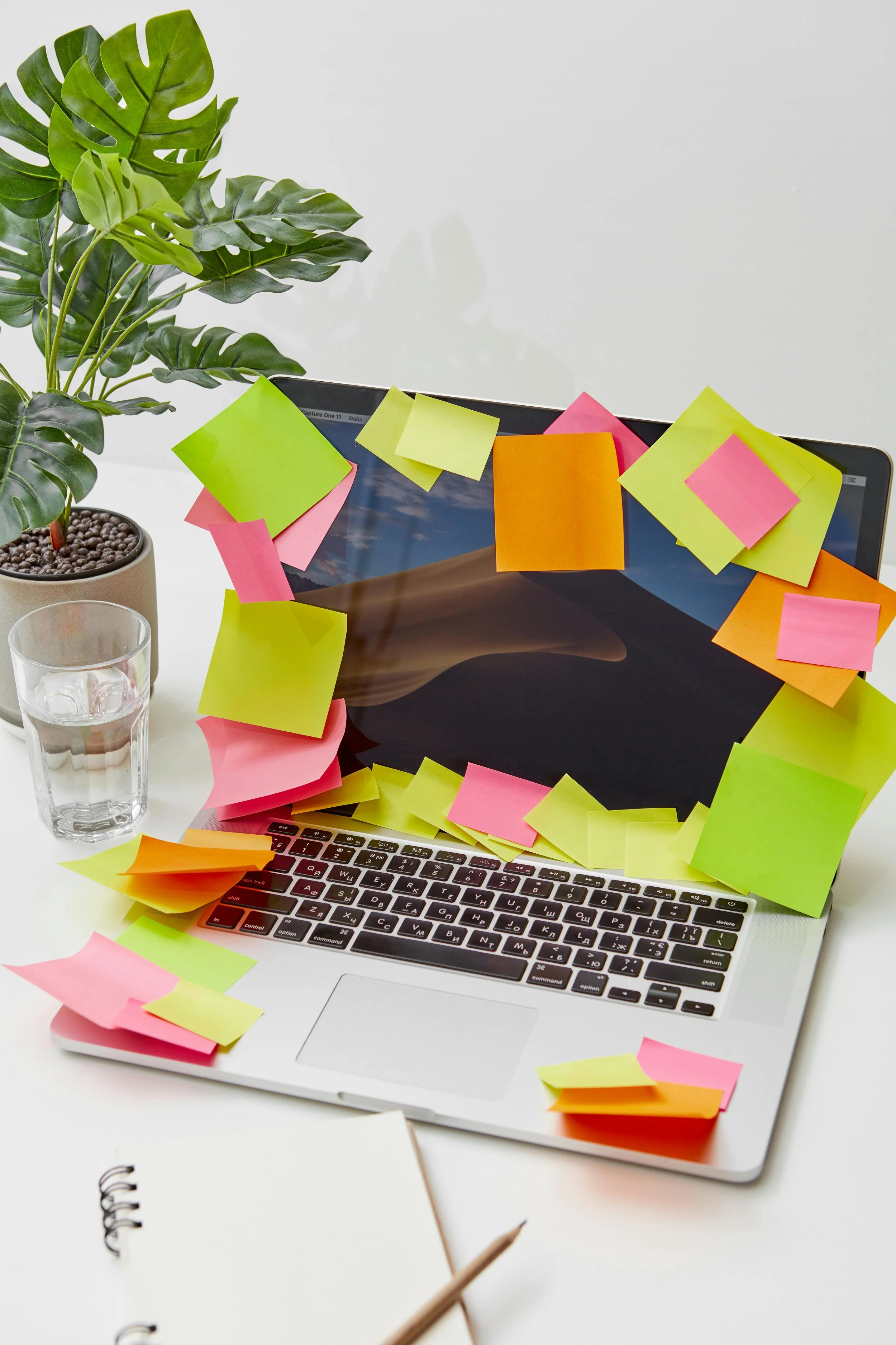 sticky notes on a laptop