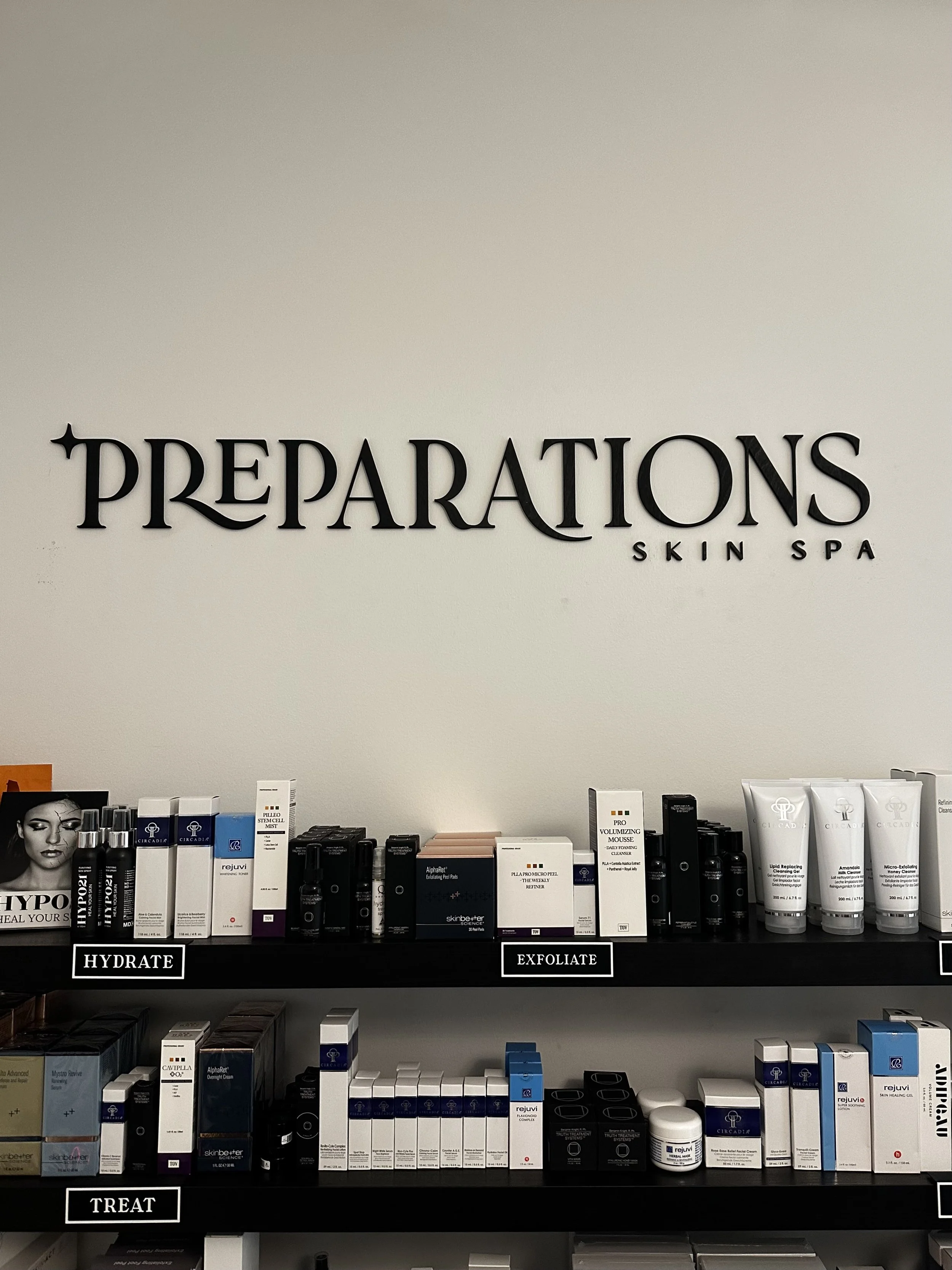 Preparations Skin Spa signage with shelves of skincare products