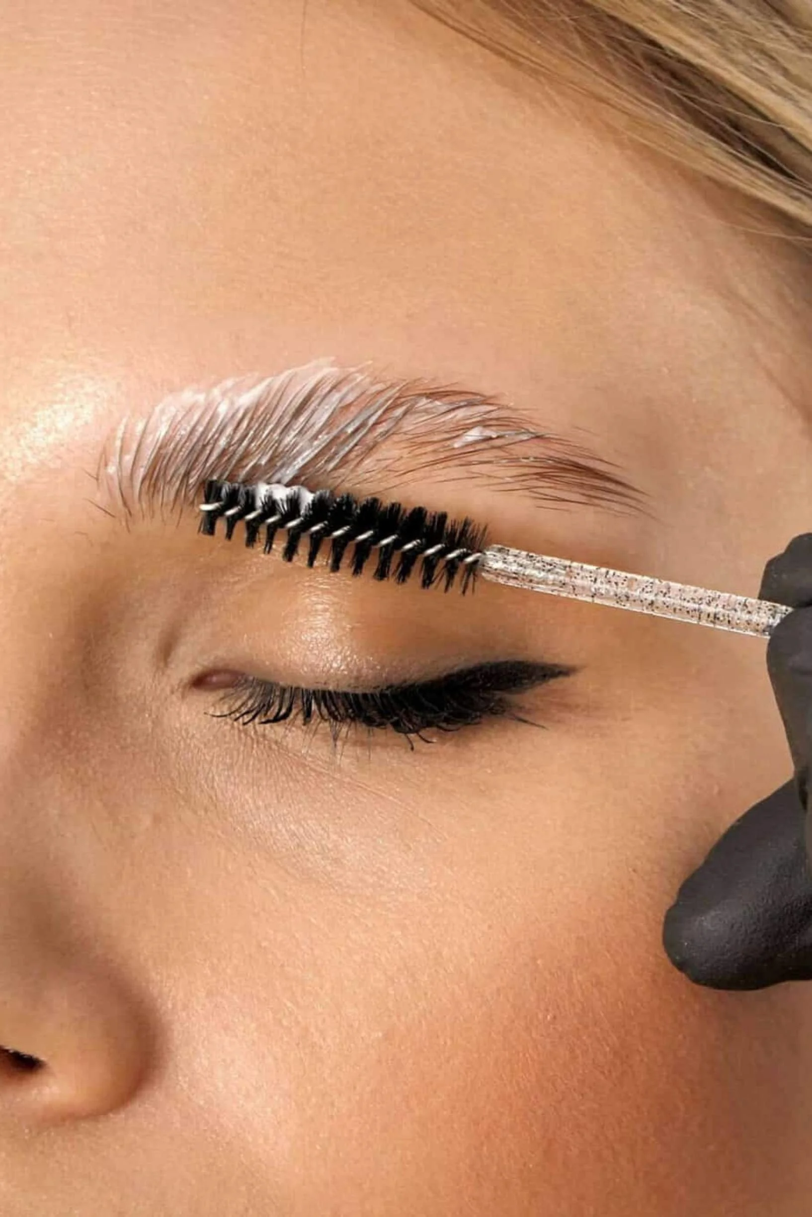 Female client receives a brow lamination at Preparations