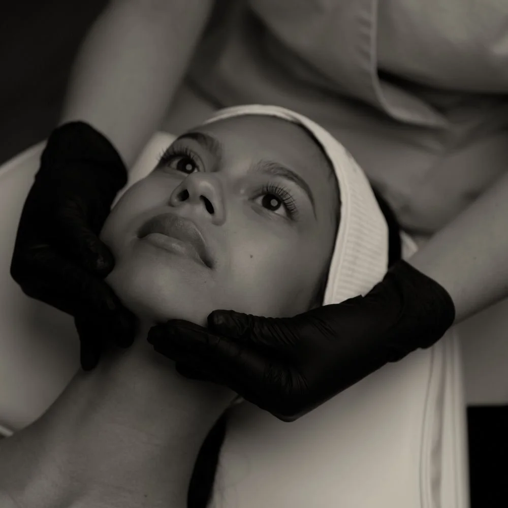 Female clients receives a facial at Preparations Skin Spa in Richardson, TX