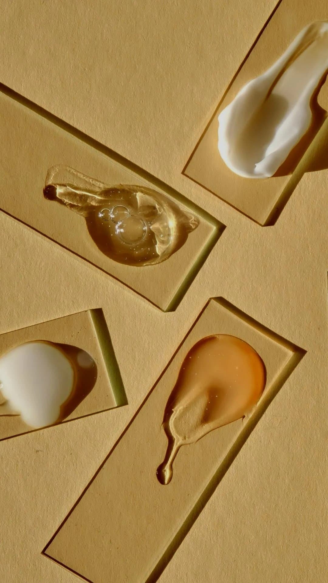 Four serums on clear glass slides