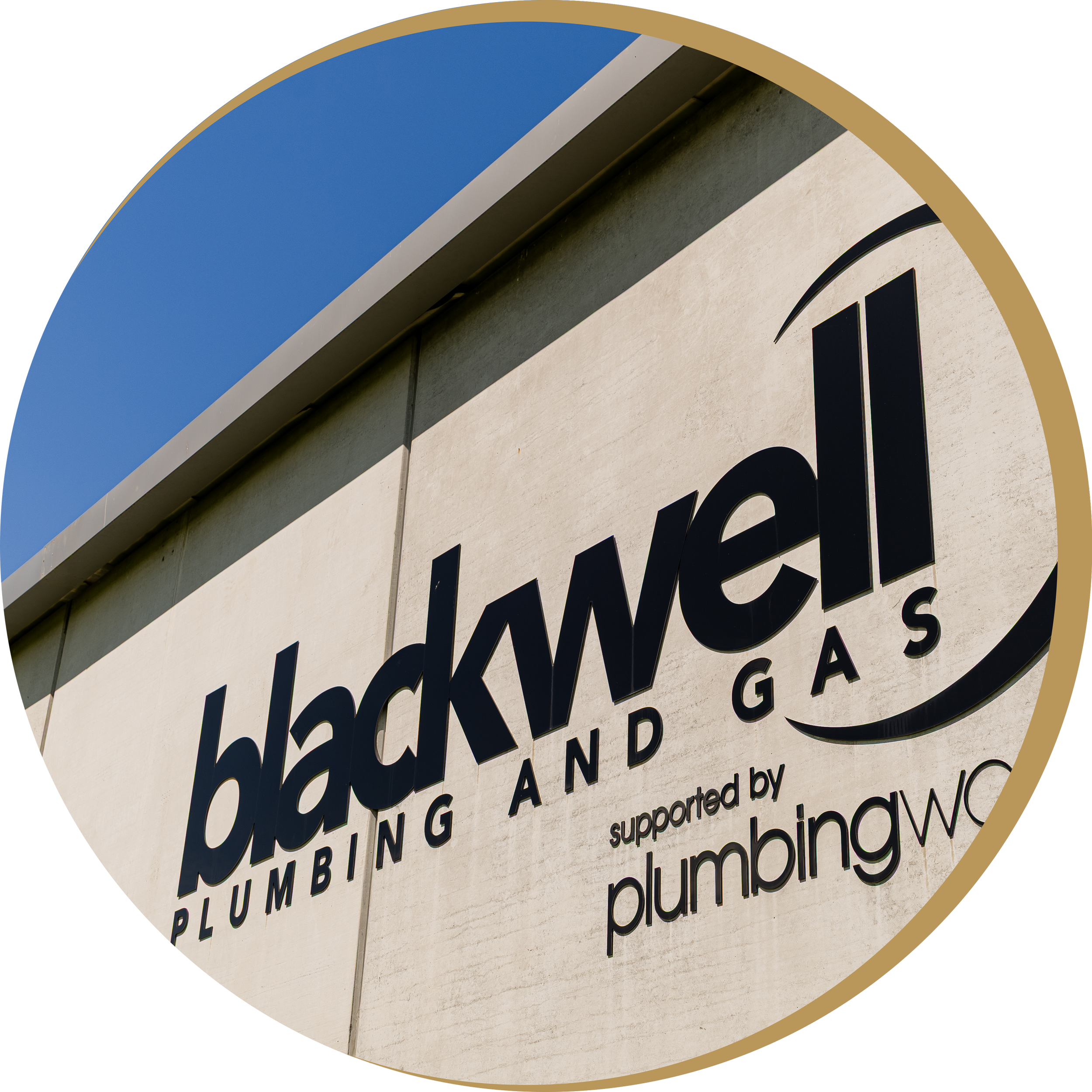 Close-up of the Blackwell Plumbing and Gas building sign.
