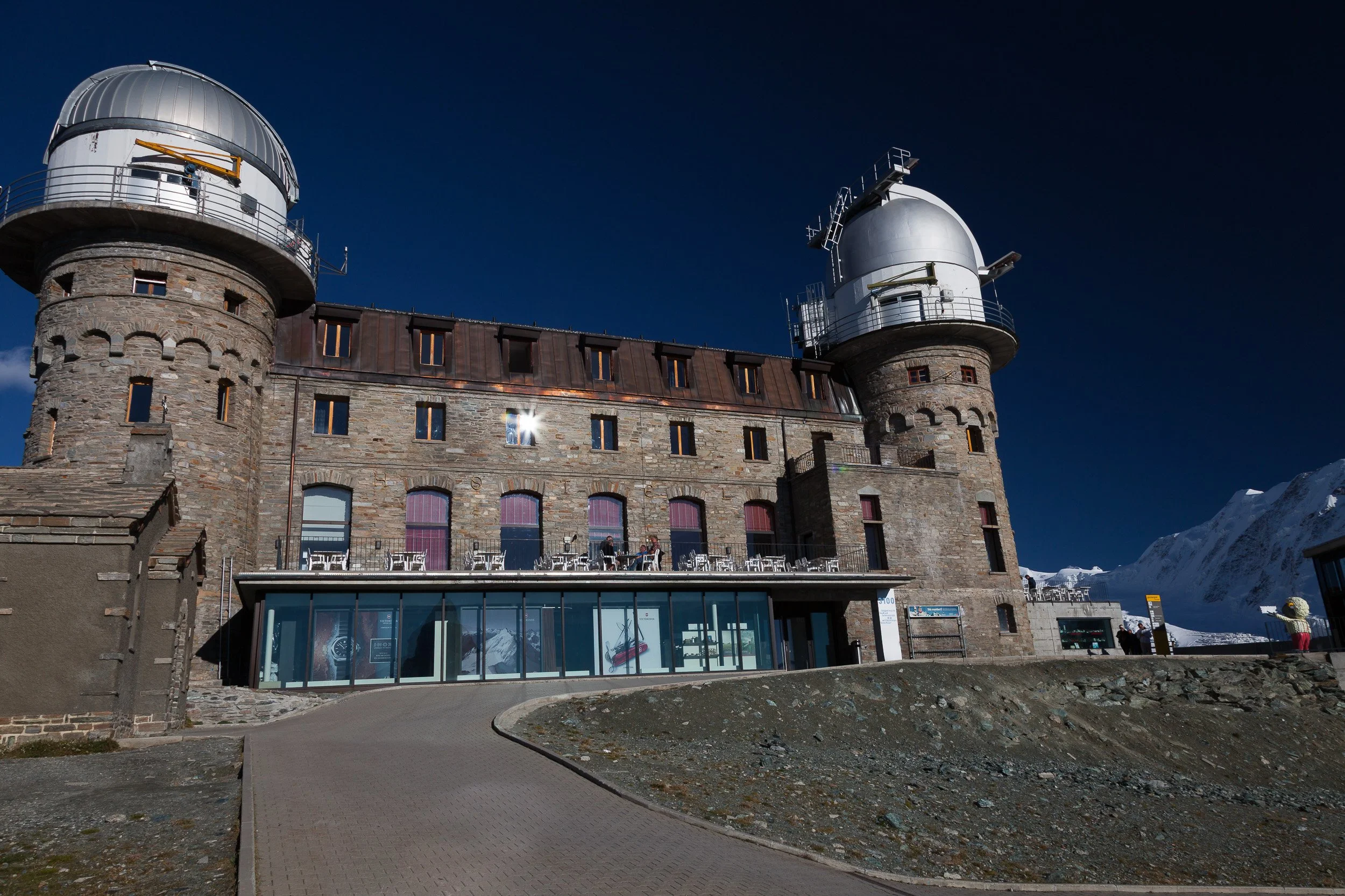 Kulmhotel Gornergrat’s stone buildings and observatory domes perched high above the surrounding Swiss Alps.