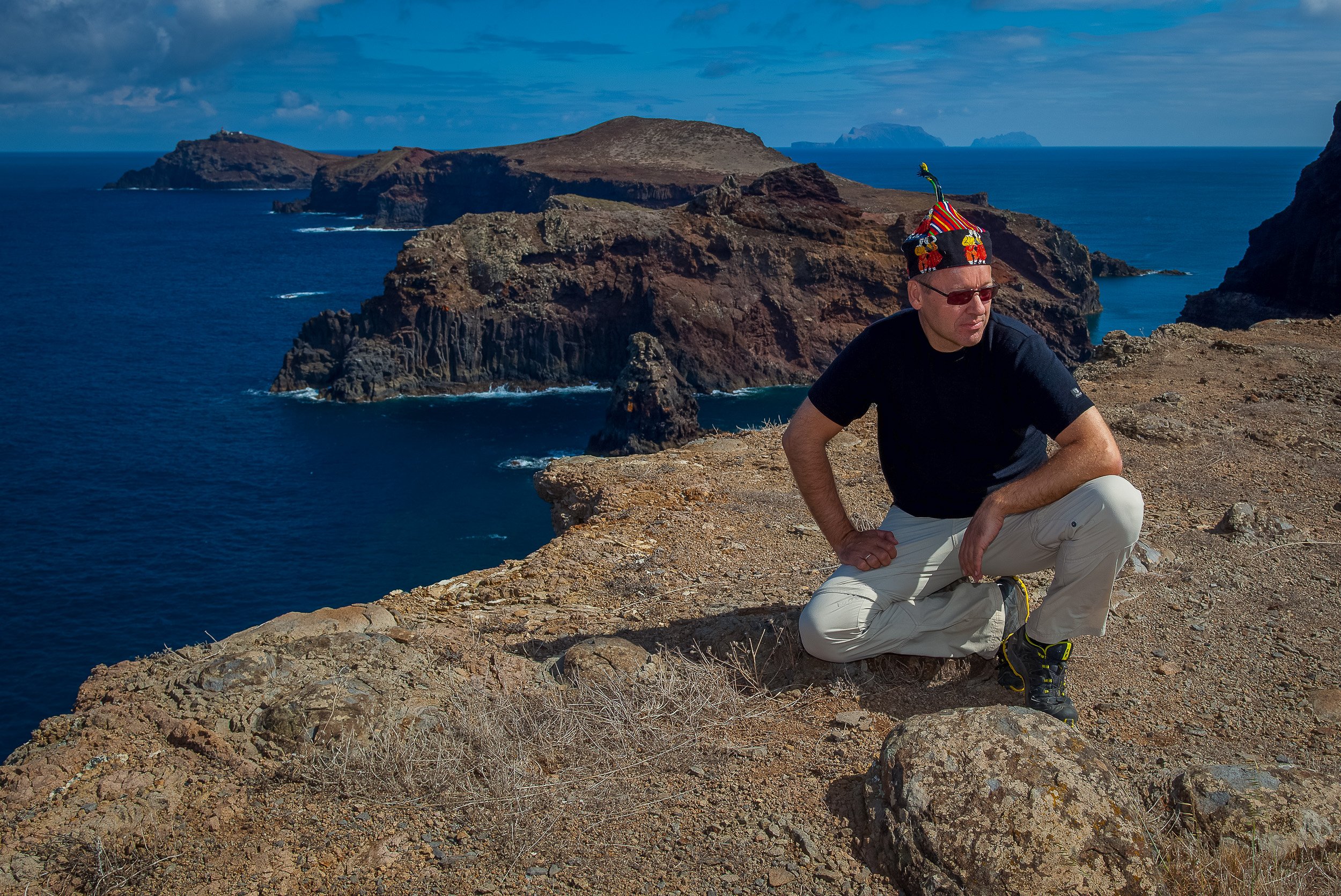 Photographer Svein Magne Tunli at Ponta de São Lourenço, with the Atlantic and volcanic headland behind him. All photographs in this Madeira portfolio are taken by photographer Svein Magne Tunli.