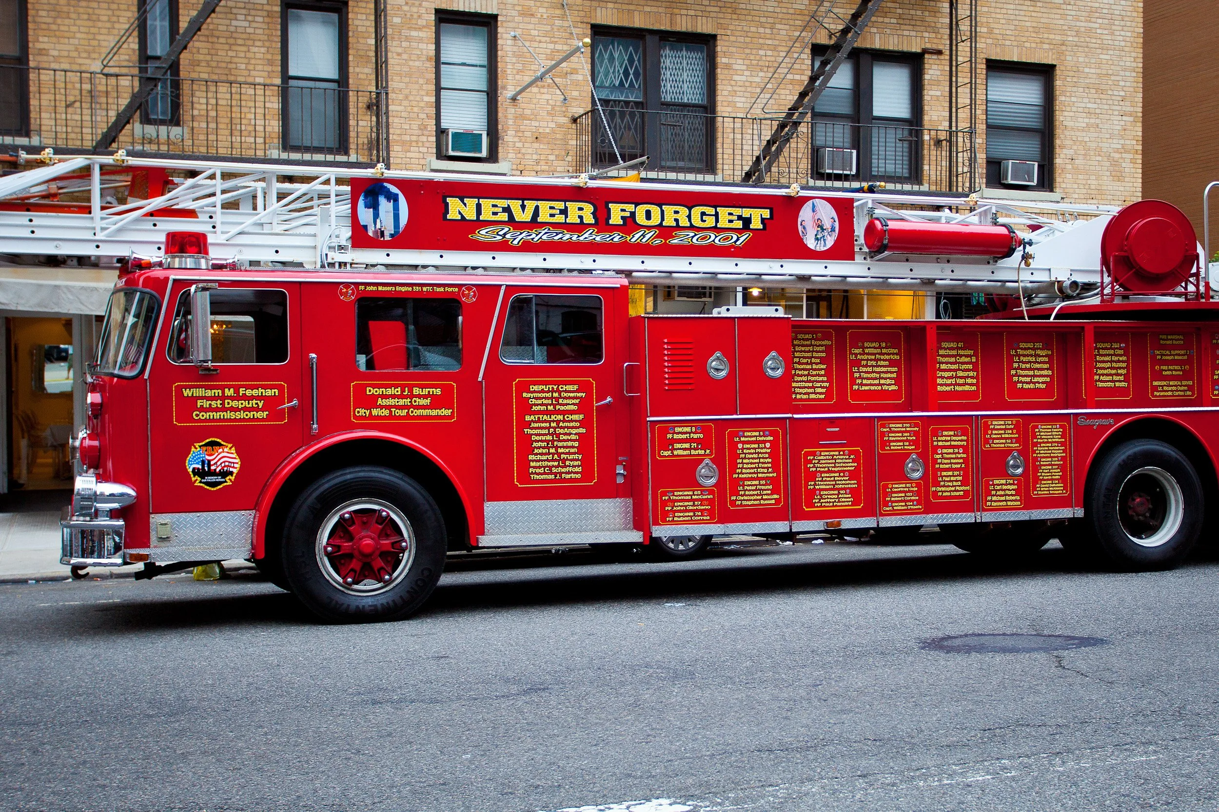 A memorial fire truck bearing the words “Never Forget” — a powerful reminder of 11 September 2001.