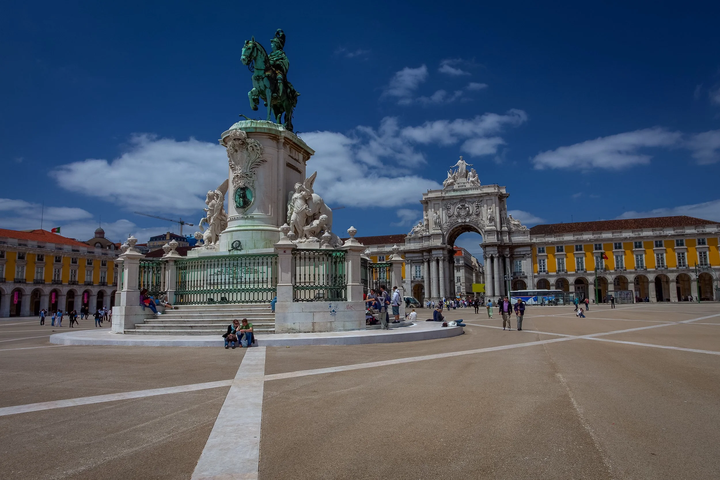 Praça do Comércio in Lisbon, with the equestrian statue of King José I, the Arco da Rua Augusta and the yellow arcades around the square.