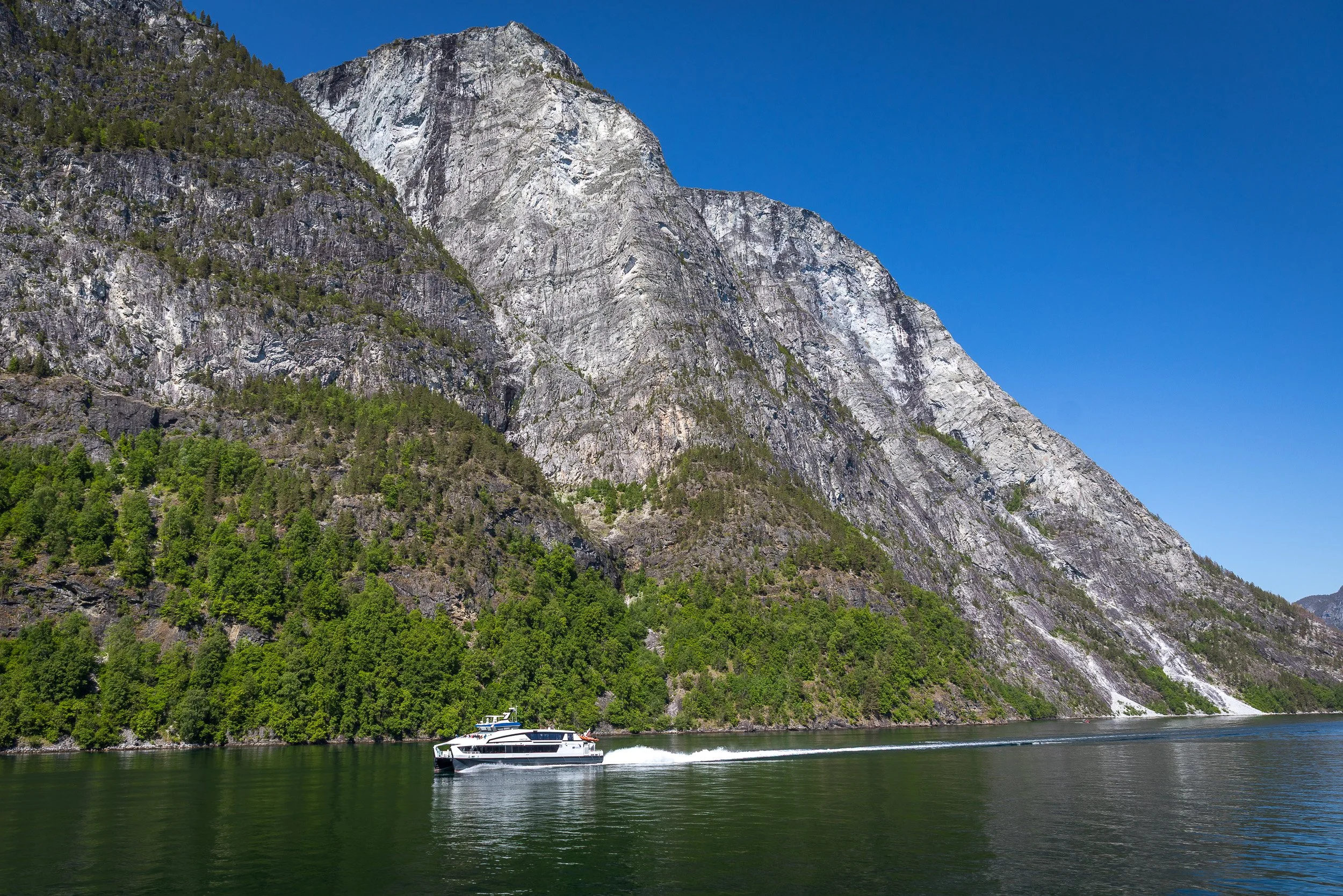 Another breathtaking angle of Nærøyfjorden, where the valley opens and layers of mountains build depth into the distance.