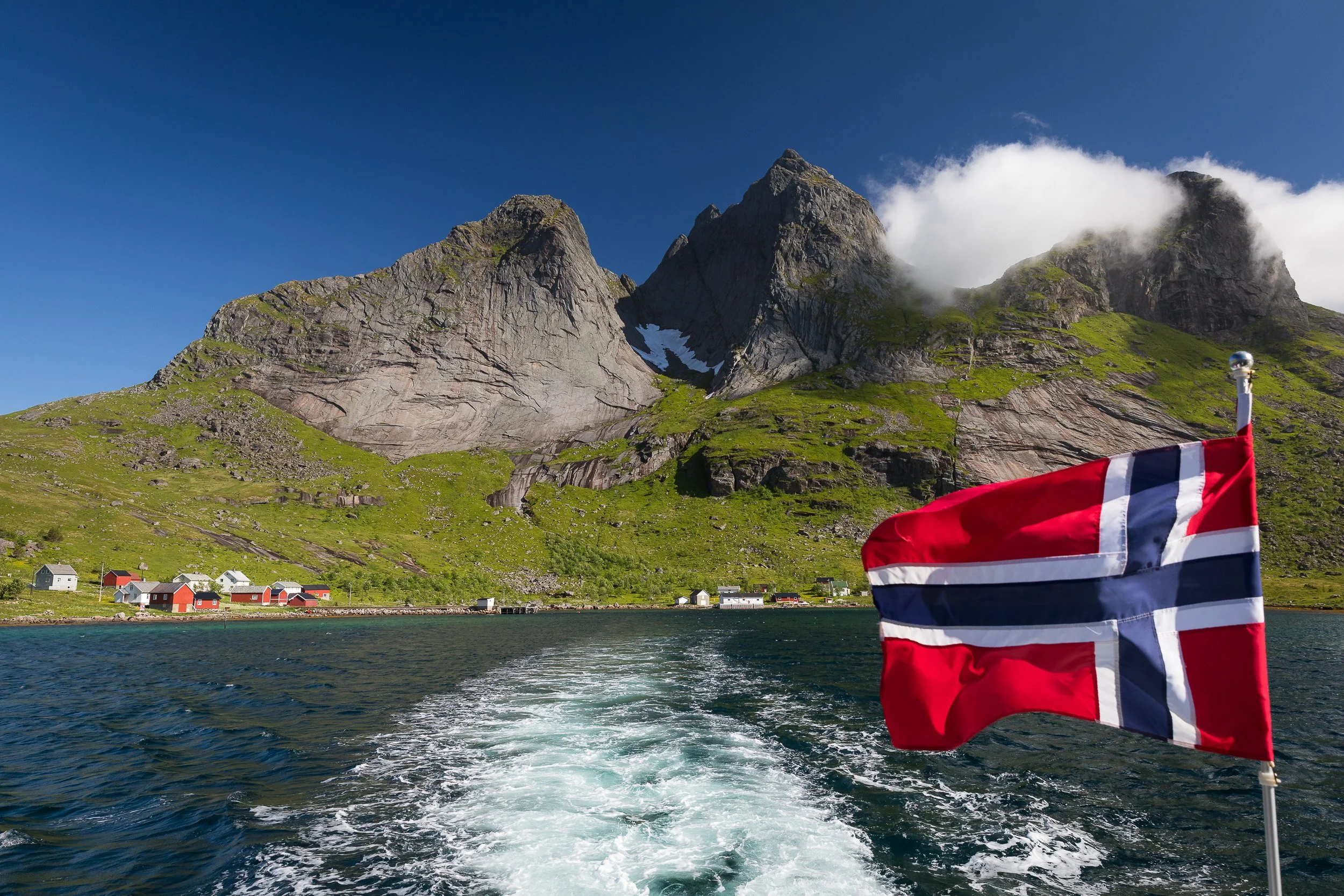 Kjerkfjorden in Lofoten, still and reflective — a quiet, powerful fjord scene shaped by rock, light and time.