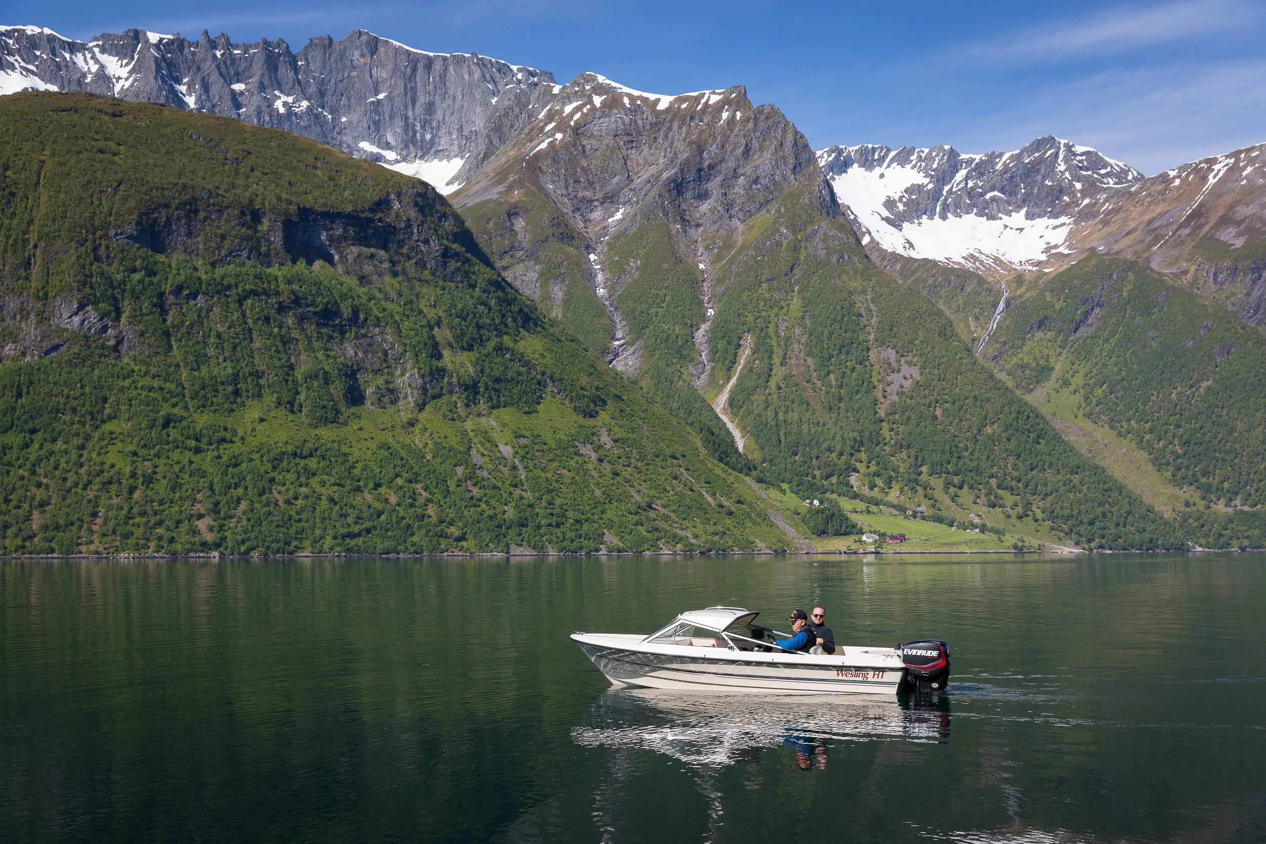 In Hjørundfjorden, turquoise water and a dripping oar capture the quiet, intimate side of the Norwegian fjord experience.