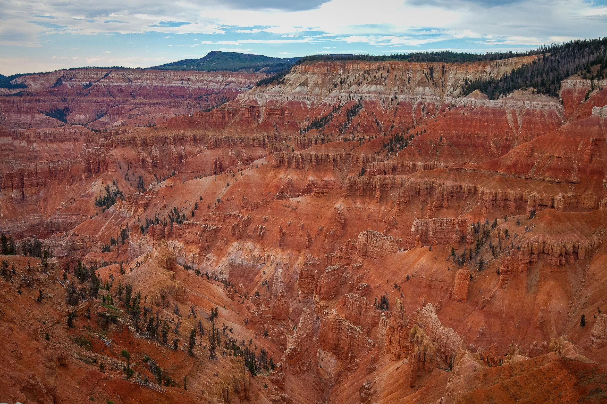 Layered red cliffs and hoodoos in Bryce Canyon National Park, Utah.