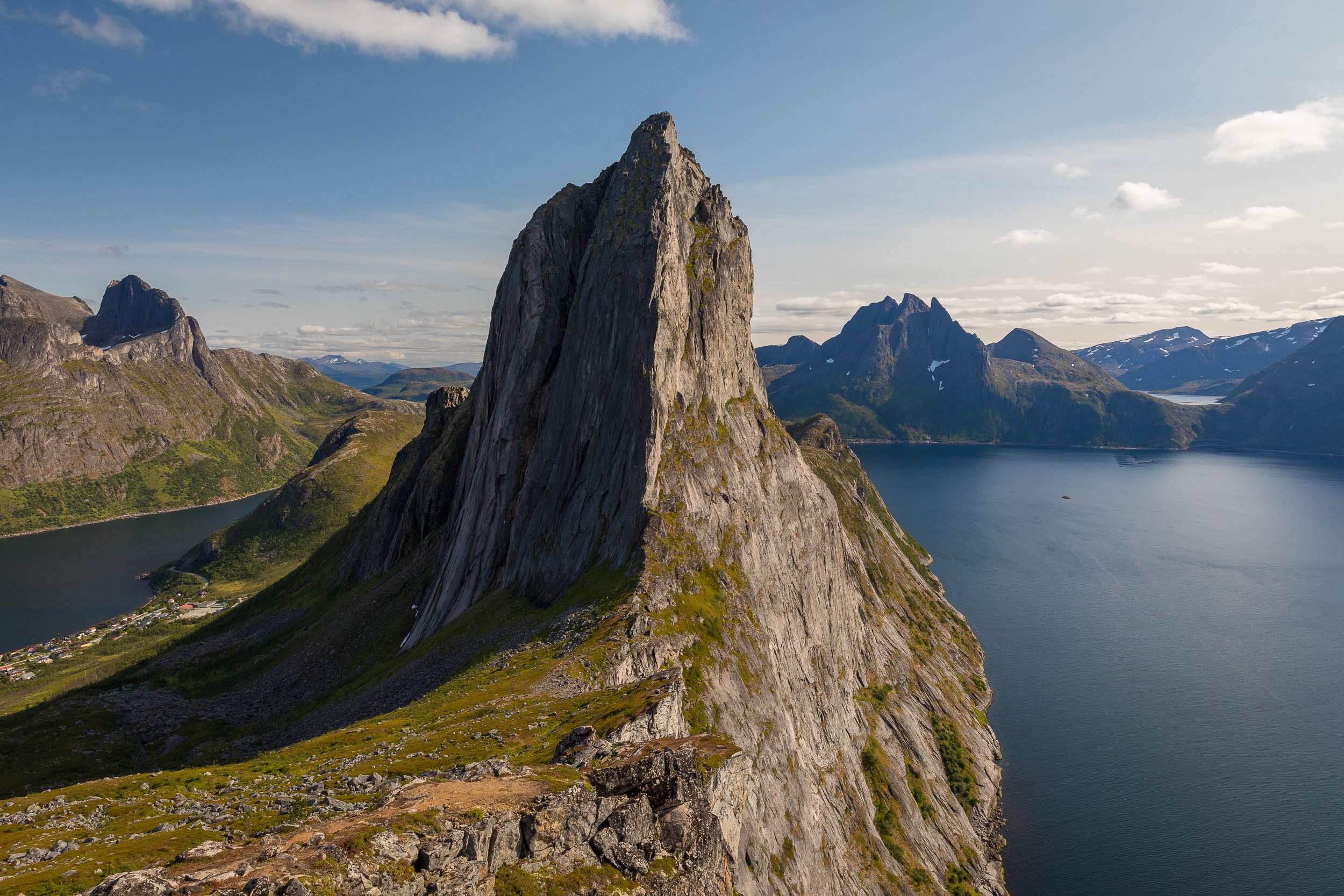 Segla rising above the fjords of Senja, seen from Hesten in clear late-summer light.