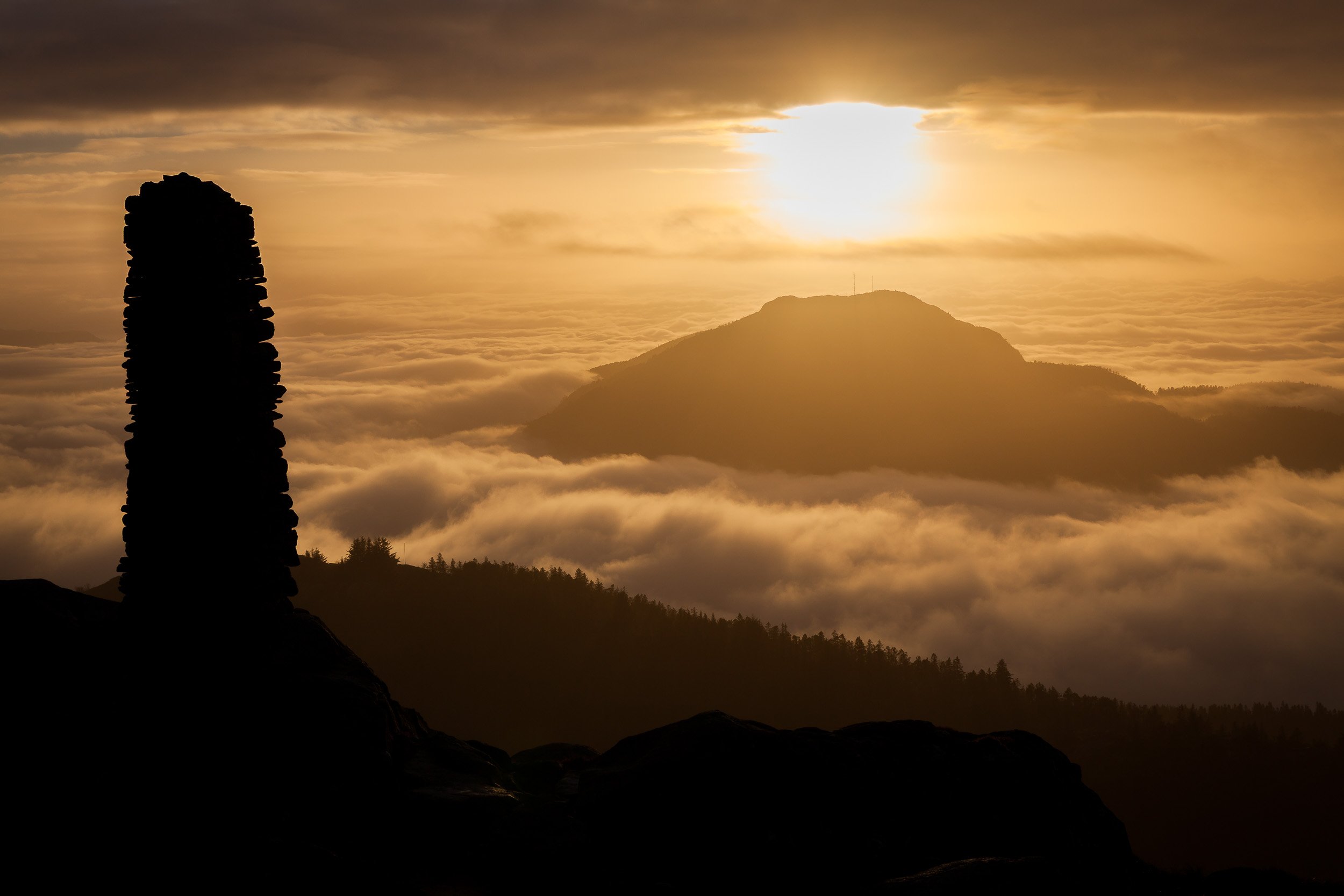 From Blåmanen (554m): low clouds over Bergen city center, Norway.