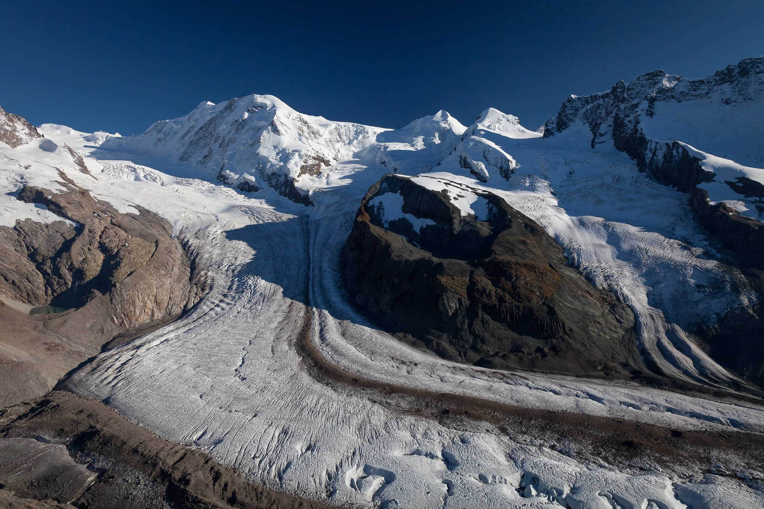 Sweeping view over the Gorner glacier and surrounding 4,000-metre peaks from the Gornergrat viewpoint above Zermatt.