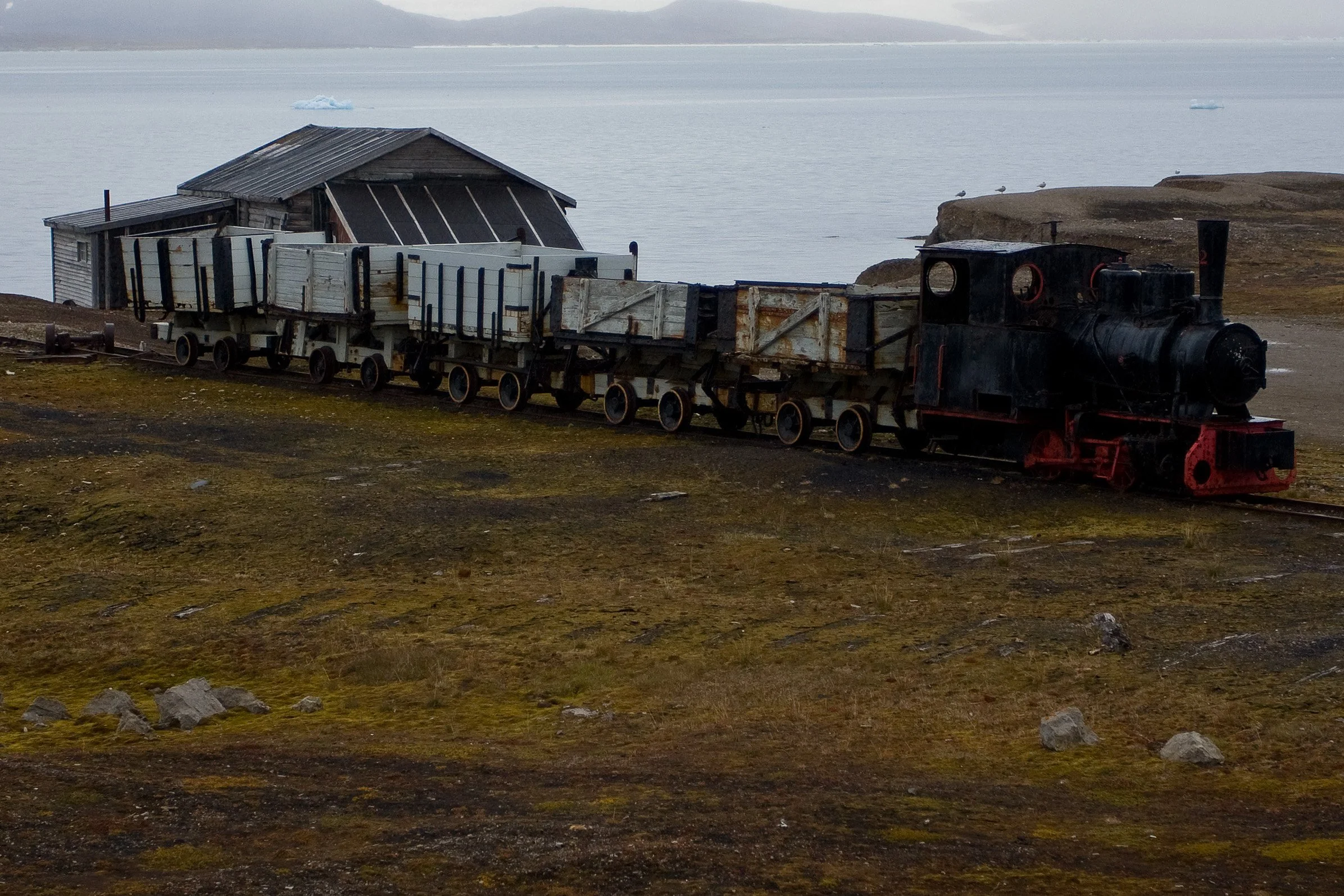 An old mining train in Ny-Ålesund recalls the industrial history behind this remote Arctic outpost.