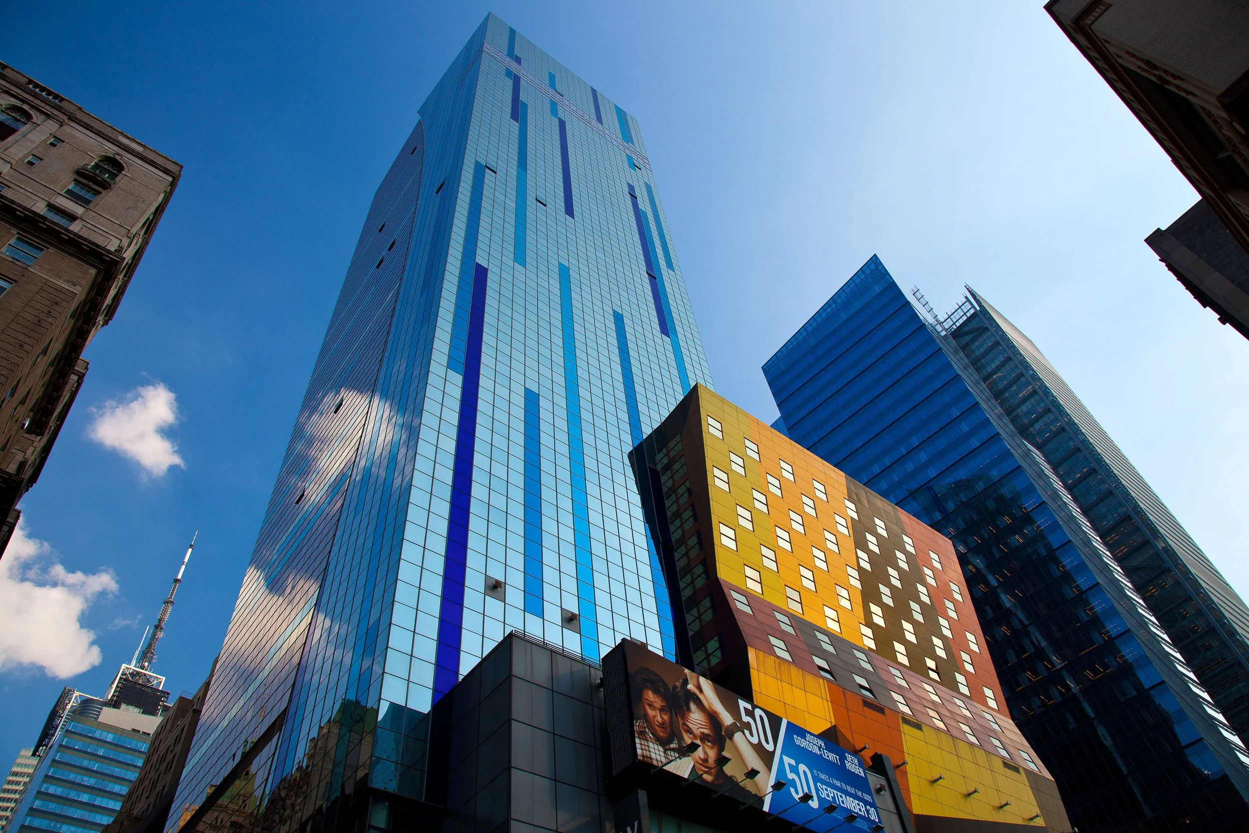 Glass, colour and sky reflected in a modern Manhattan streetscape.