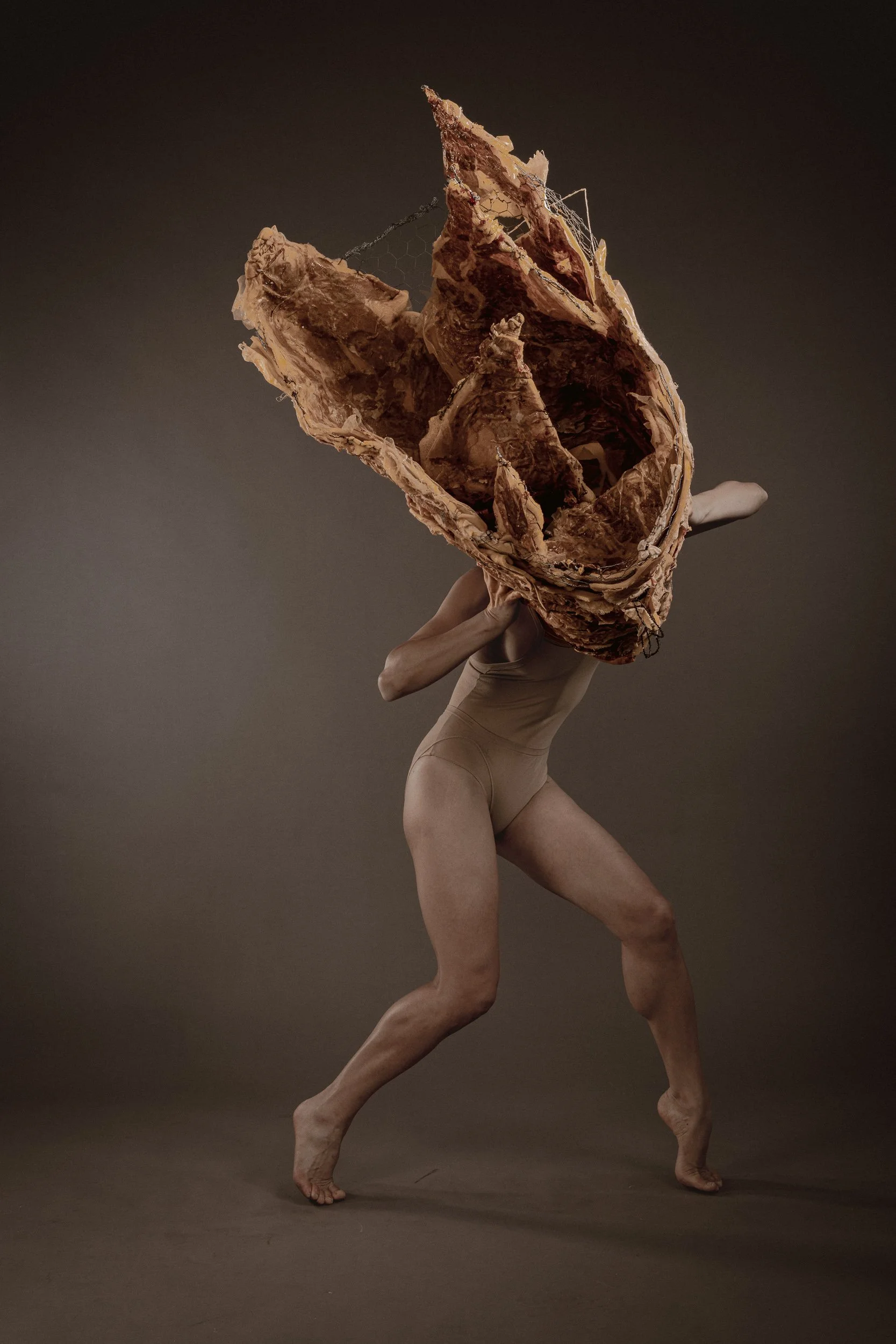 UNTITLED (Not Dead Yet), Studio Documentation #2, 2026.
Archival pigment print.
Foam, chicken wire, beeswax, latex, paper, and wire.
This work is about the struggle to remain relevant in society. The piece is fighting with the body (power structure) 