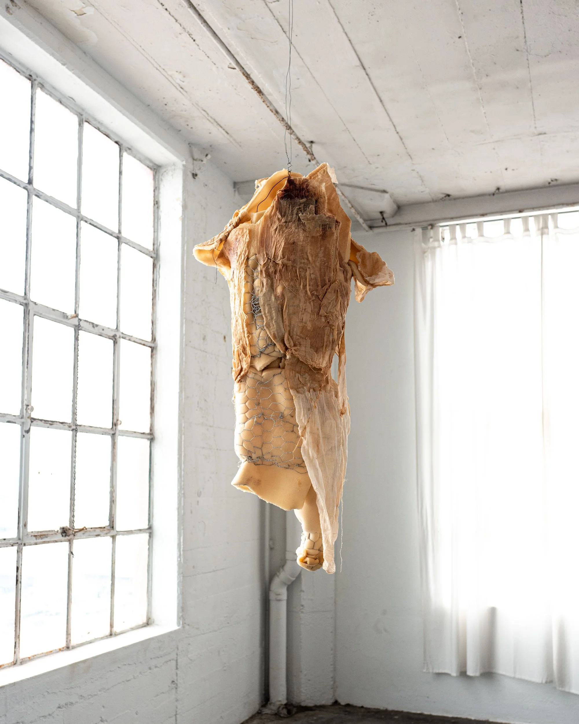 UNTITLED (Body 2), 2026; 42" x 18" x 14"; Industrial foam, chicken wire, beeswax, gauze, and wire; 