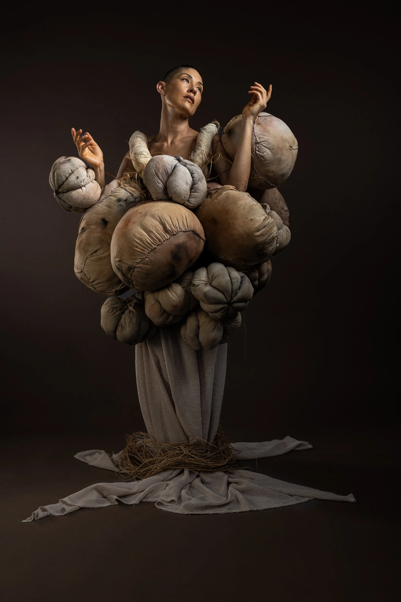 UNTITLED (Emerge) Studio Documentation #1, 2026.
Archival pigment print.
Studio documentation (Fabric, polyester fill, fabric, foam, thread, and industrial wire).
A study in “Awkward Beauty.” The piece has evolved into a heavy, overwhelming mass. The