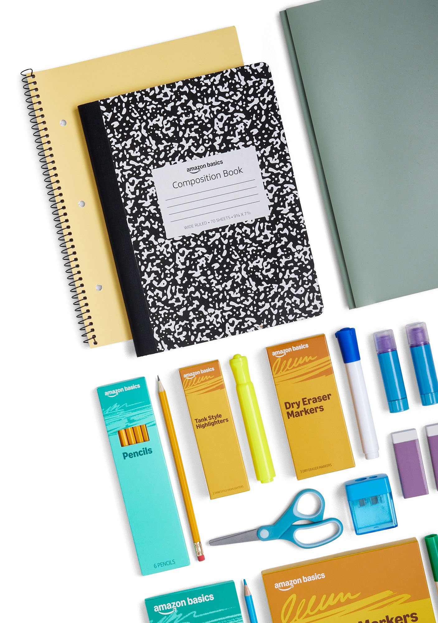 School supplies including notebooks, pens, highlighters, erasers, scissors, and tape laid out on a white surface.
