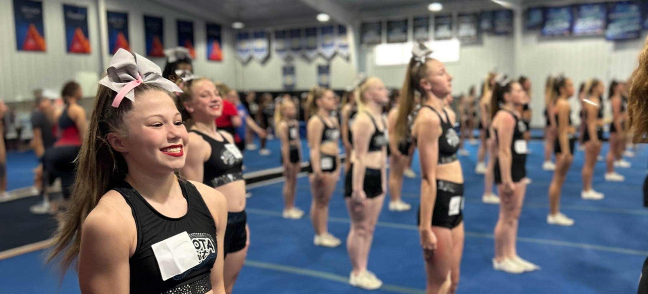 Cheer athletes participating in a workshop.