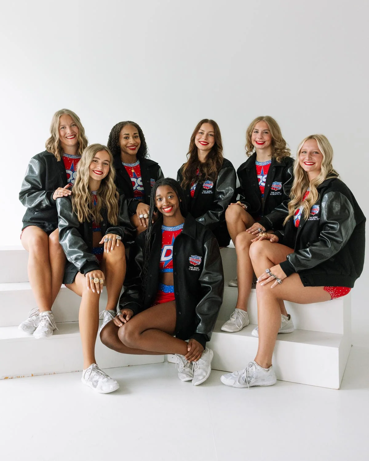 Dakota Spirit All-Star Elite Seniors posing with their championship jackets.