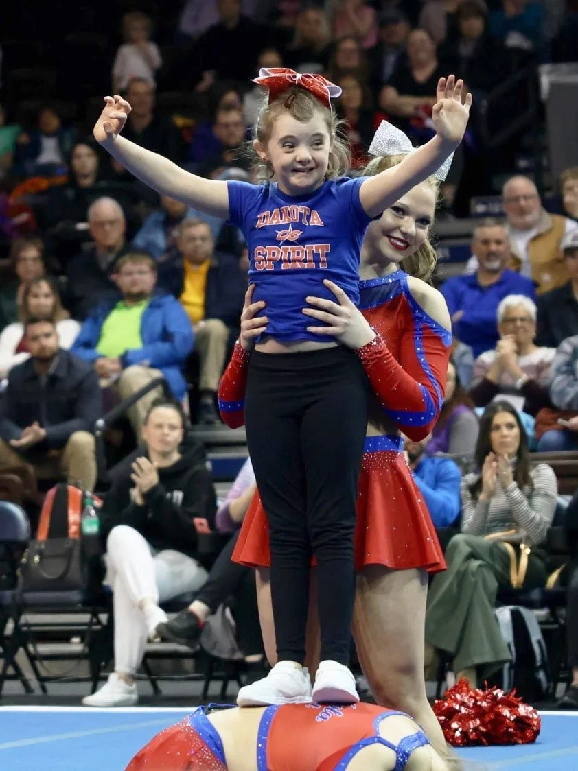 A Dakota Spirit cheer abilities athlete performing during the Valentine's Classic competition.