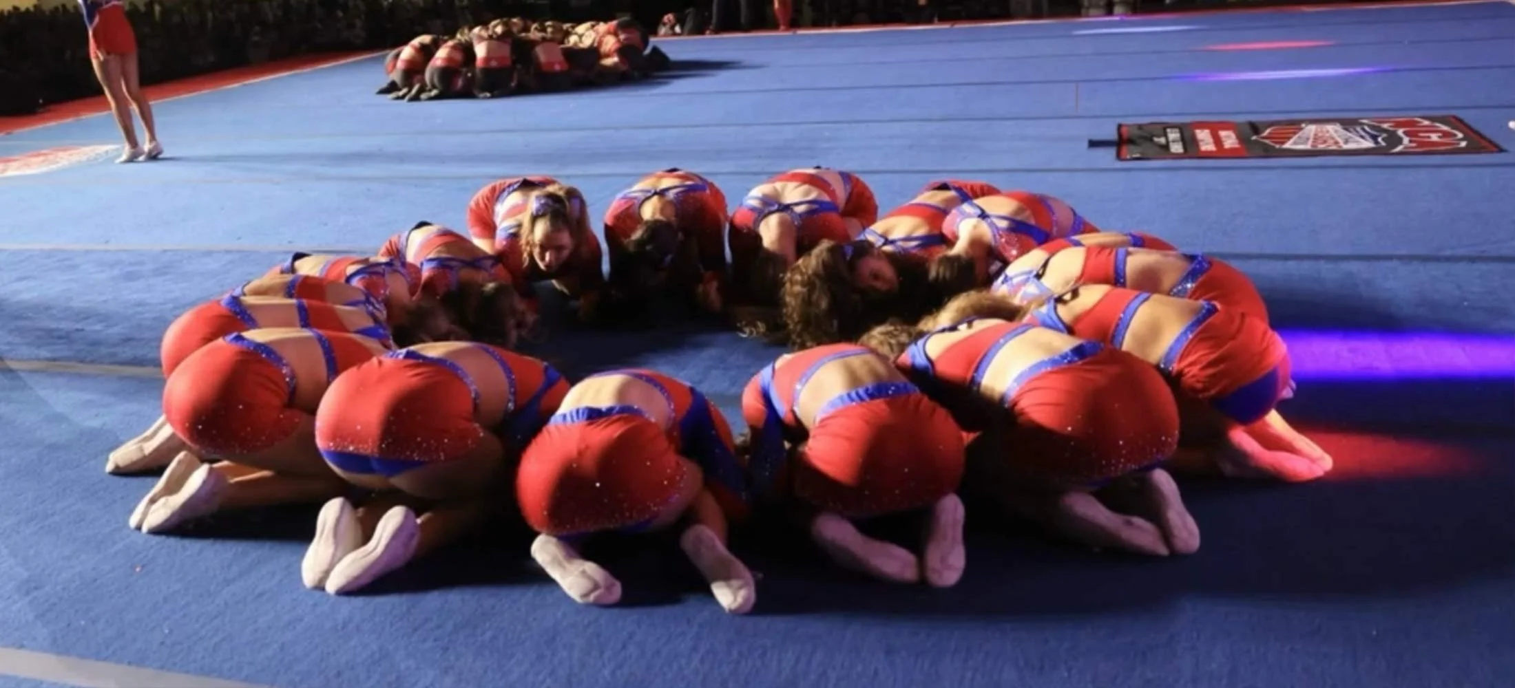 Dakota Spirit Athletes forming a circle.