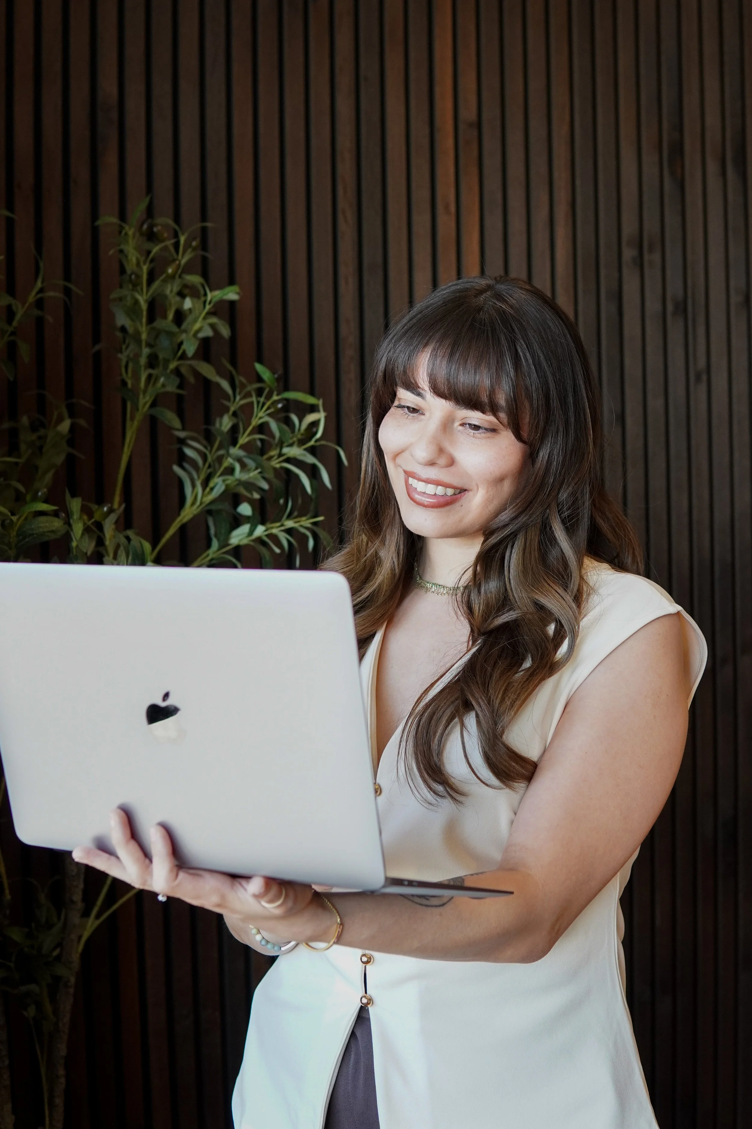 renee on laptop doing a virtual skin consultation
