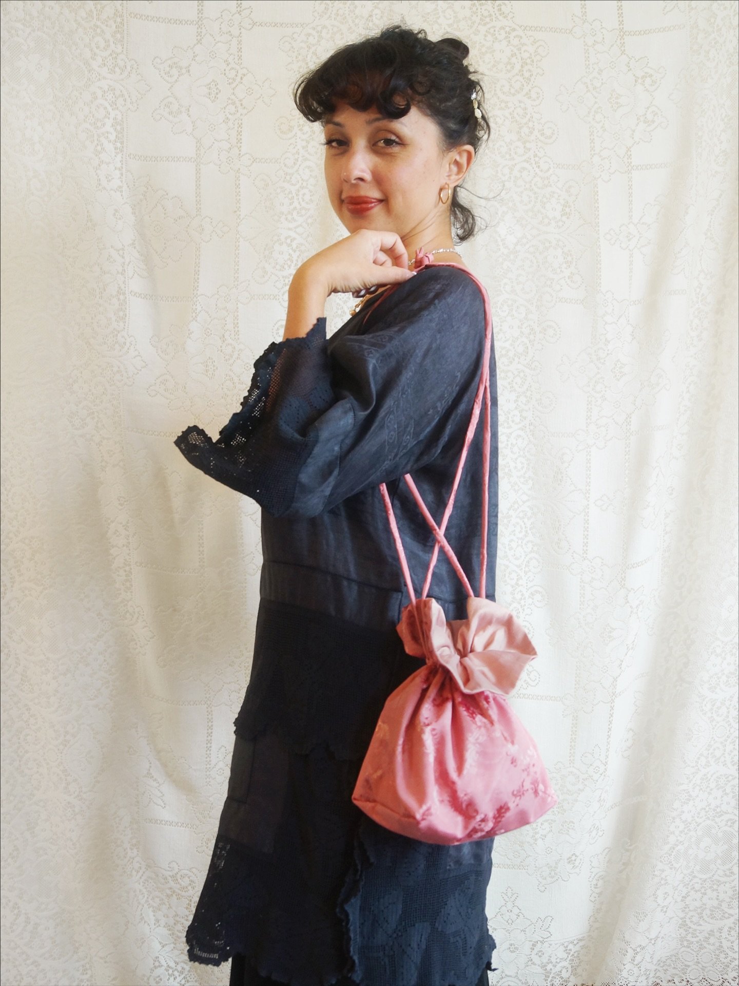 Pink Moir&eacute; Pouch 🌸 

A little cloud of rose pink, gathered like a secret.
This pouch feels as if it drifted out of a daydream.
Moir&eacute; and silk shantung shimmering gently,
changing mood when you turn it inside out.
When you pull the ribb