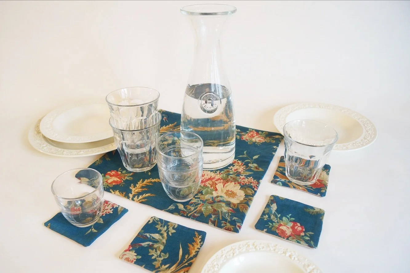 19th-Century French Floral Table Mat &amp; Coaster Set, No.1💐

Set your table as if setting a scene from a forgotten French garden.
This table mat and coaster set is crafted from a 19th-century textile alive with wandering vines, soft blooms, and th