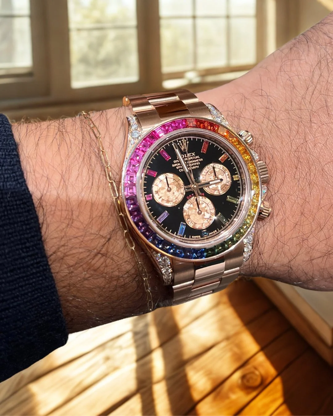 Rolex Daytona Rainbow rose gold collector model with rainbow sapphire bezel