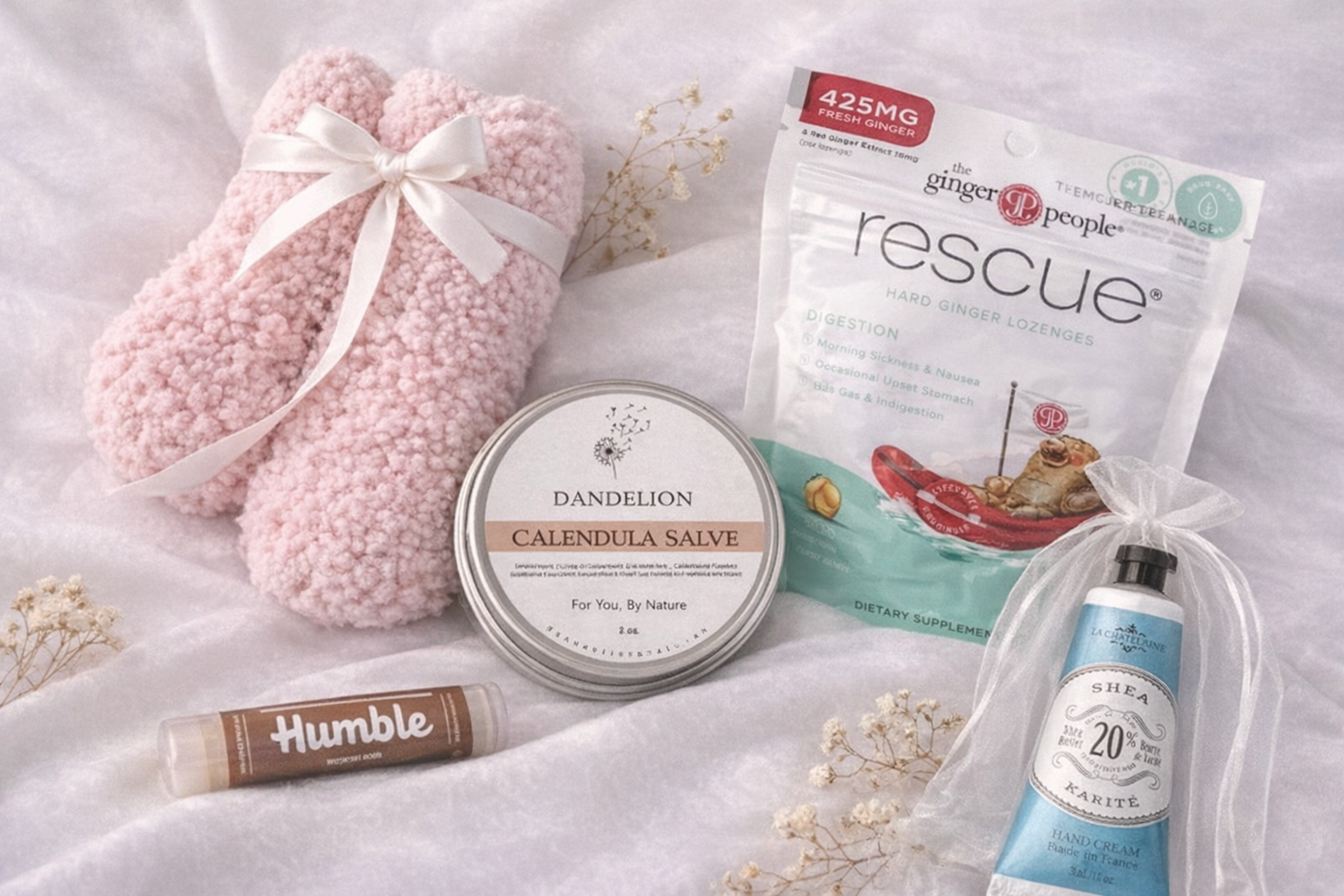 Self care items included in Blush Calm comfort gift box soft socks skincare and ginger chews thoughtful recovery wellness or cancer support gift for women