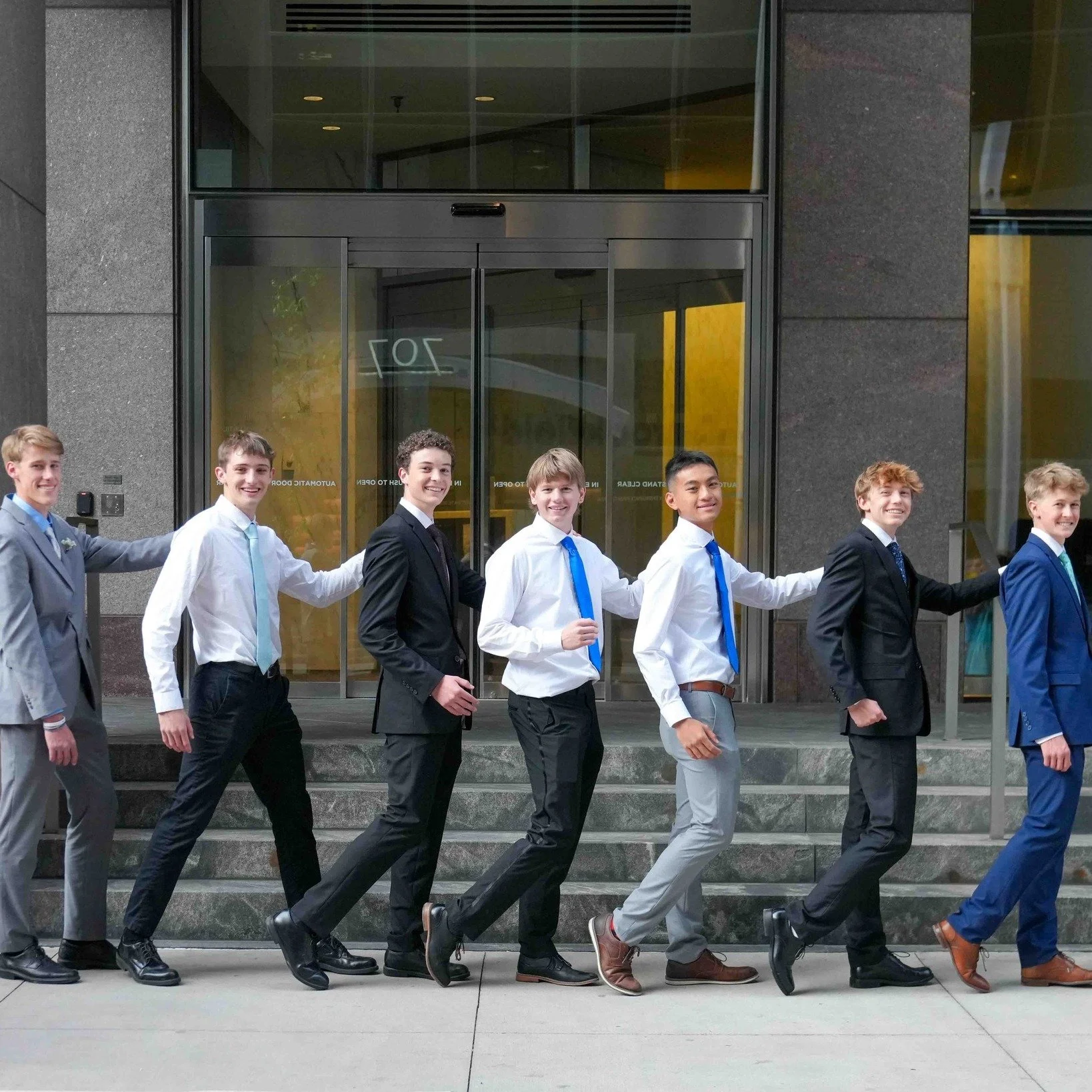Stepping Out in Style - Sharp suits - City skyline, there&rsquo;s nothing quite like the energy of prom night. 

Whether it&rsquo;s the classic poses or the candid walks, these guys definitely understood the assignment. Swipe through to see the highl