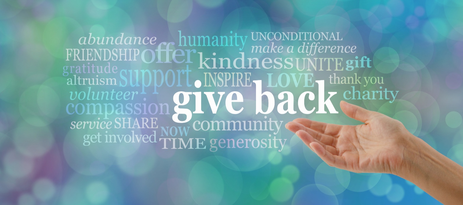 Banner with words and hand in the bottom right corner, main word is give back