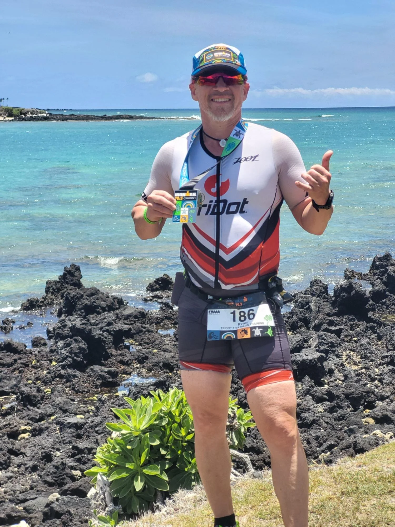Ascend multisport athlete with finsher medal at IRONMAN Honu 70.3 qualified for 70.3 Worlds