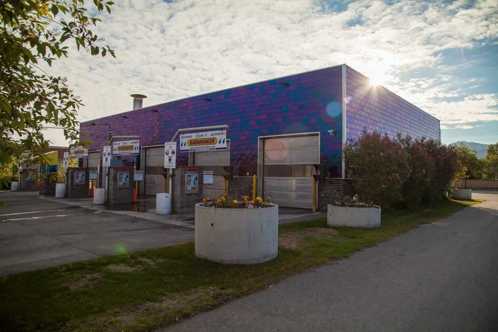 Rainmaker Car Wash with purple and teal  iridescent exterior cladding.