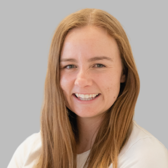 Line art drawing of mountains with a river flowing at the base, all in white on a black background.