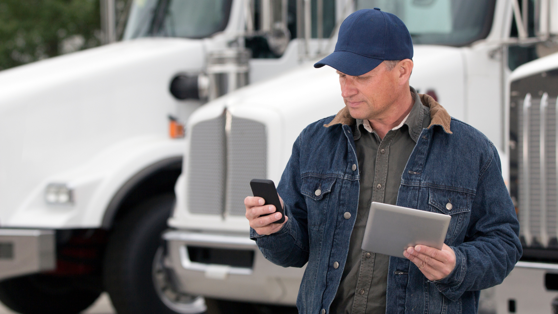 Florida truck driver reviewing insurance coverage on tablet