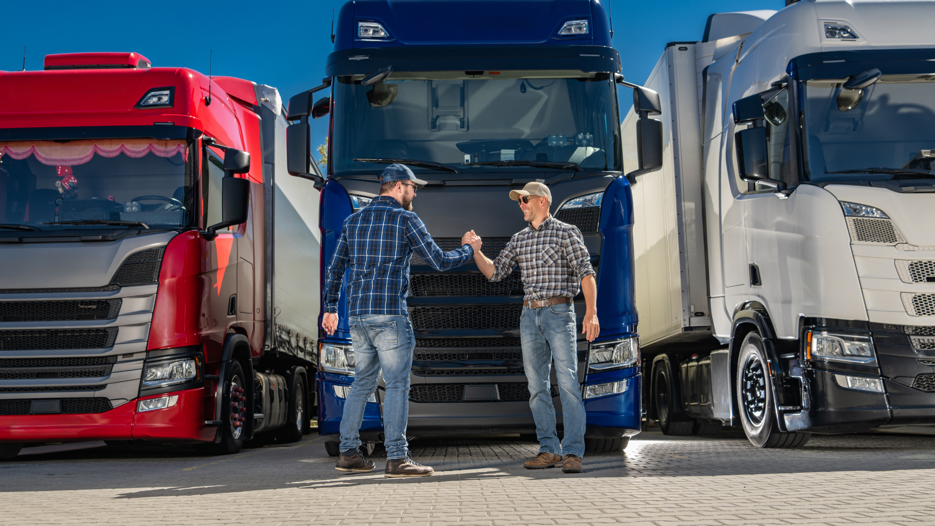 Texas truck drivers discussing fleet insurance strategy