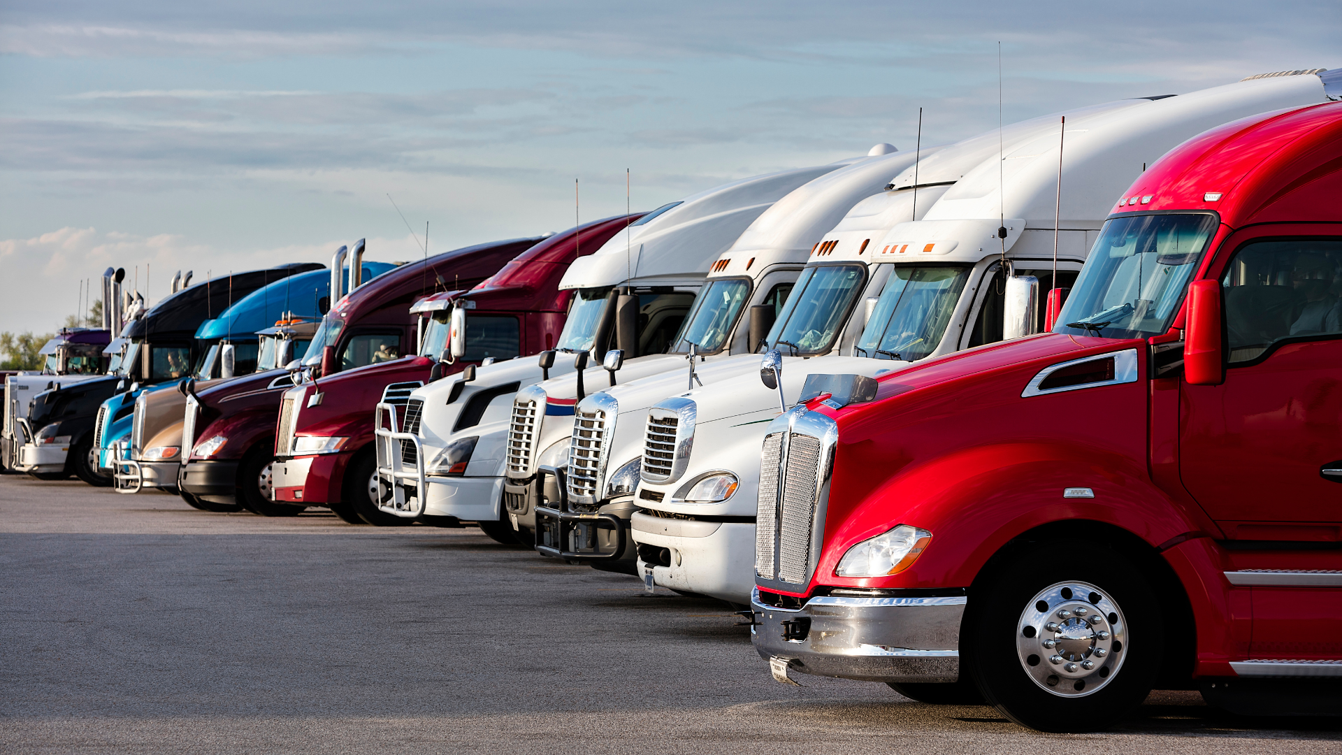 Fleet of semi trucks representing the future of trucking insurance